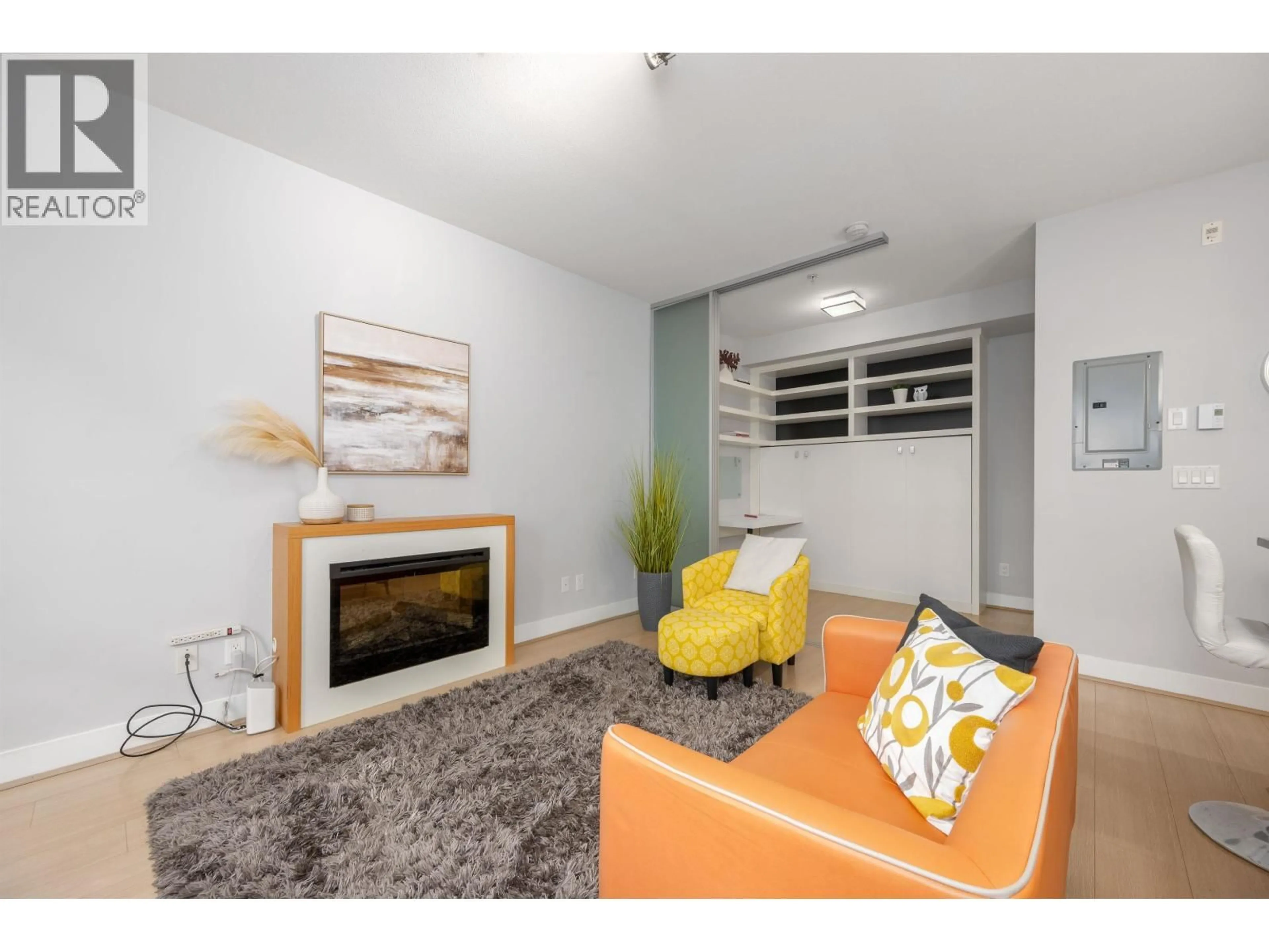 Living room with furniture, unknown for 115 - 735 15TH STREET, North Vancouver British Columbia V7M0B8