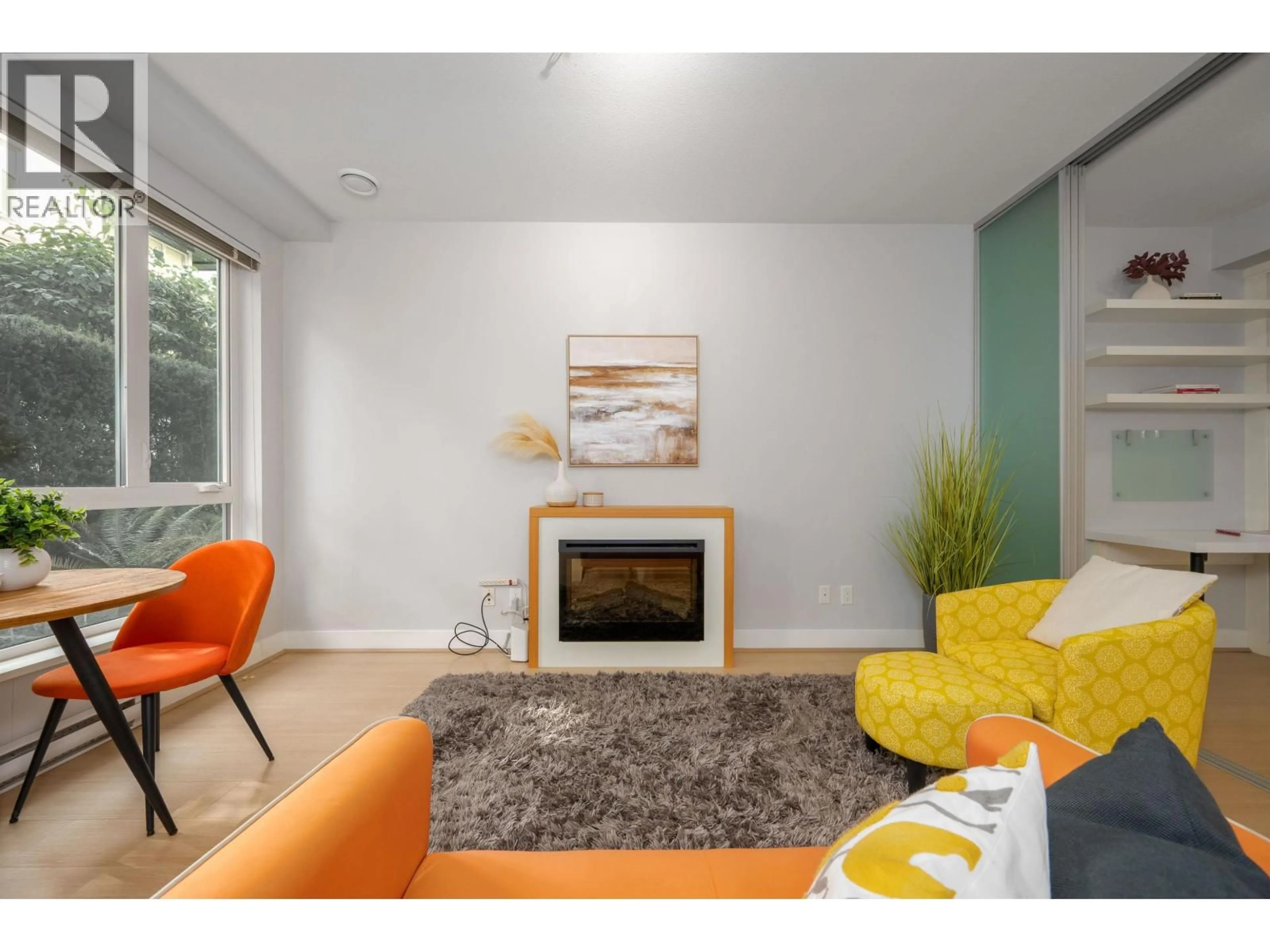 Living room with furniture, unknown for 115 - 735 15TH STREET, North Vancouver British Columbia V7M0B8