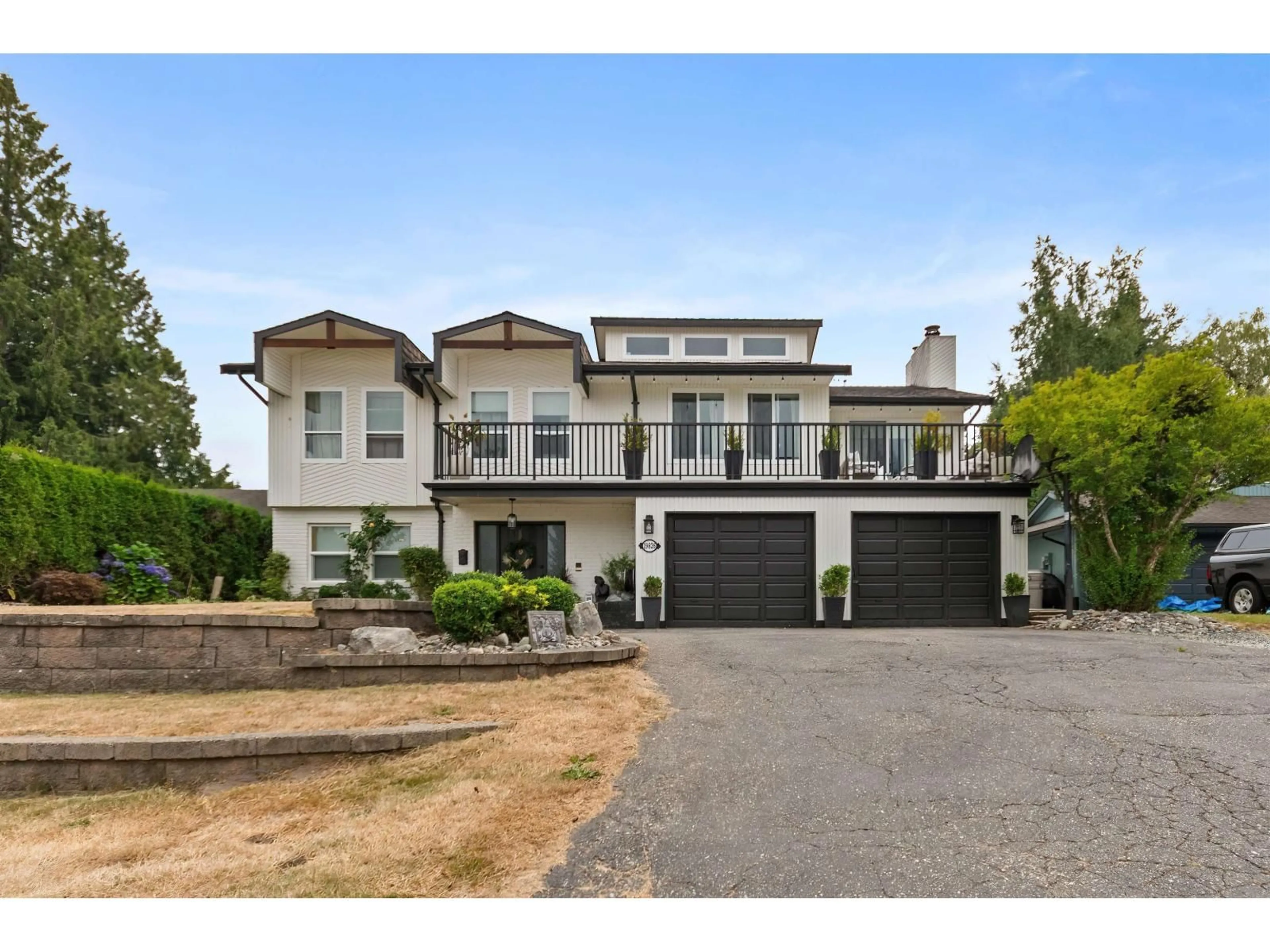 Home with vinyl exterior material, street for 19826 48A, Langley British Columbia V3A6Y2