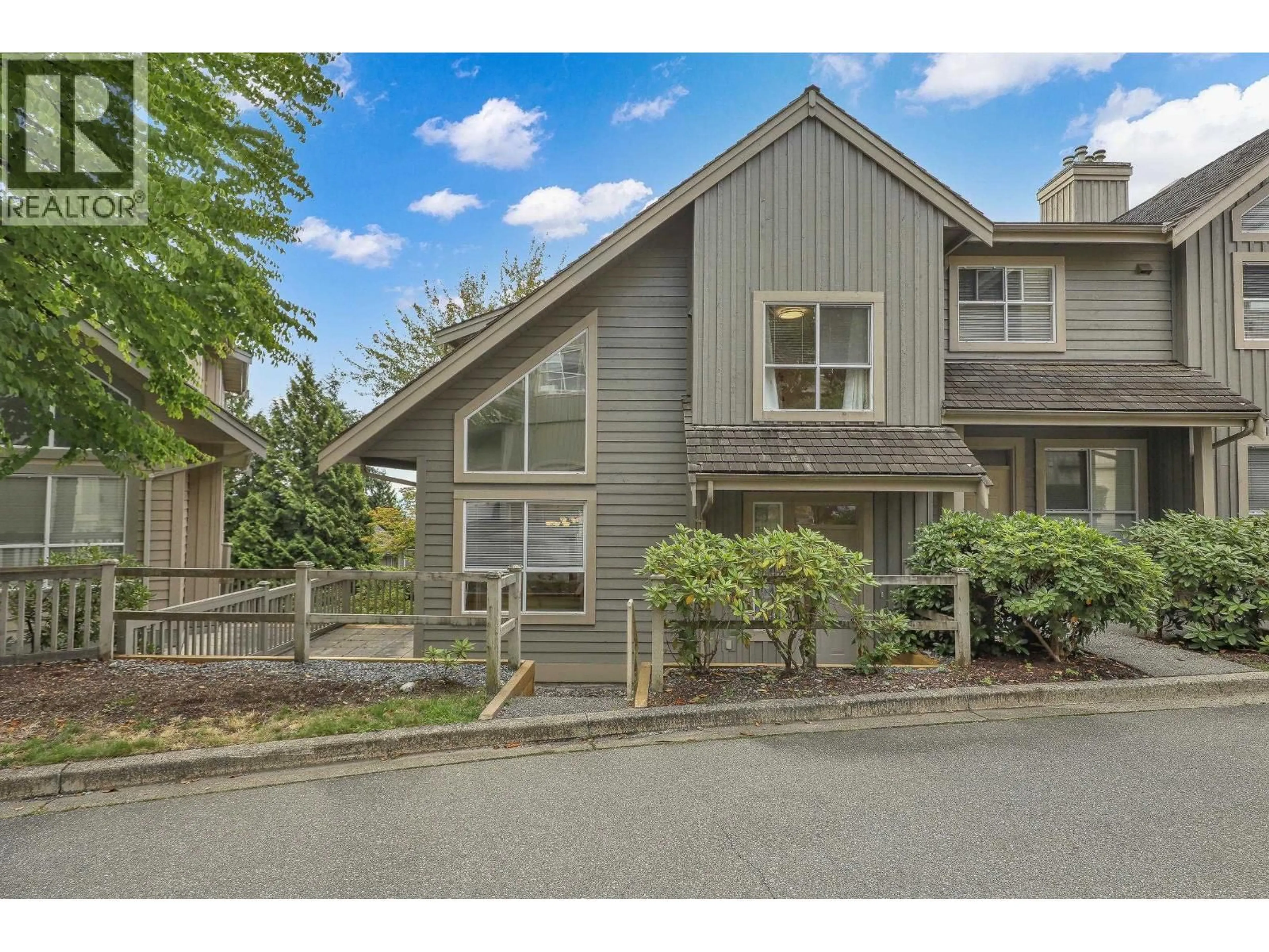 A pic from outside/outdoor area/front of a property/back of a property/a pic from drone, street for 220 - 1465 PARKWAY BOULEVARD, Coquitlam British Columbia V3E3E6