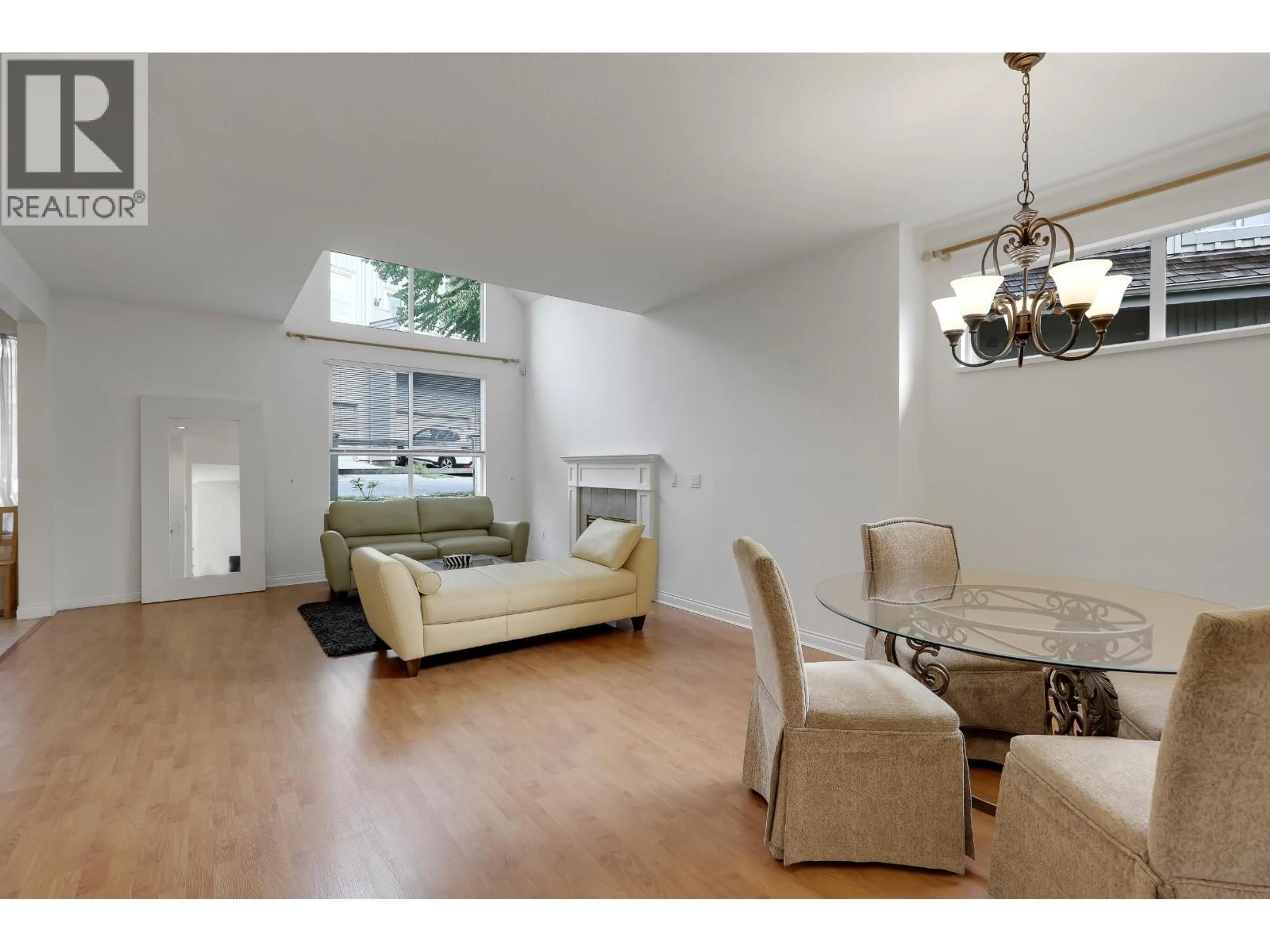 Living room with furniture, wood/laminate floor for 220 - 1465 PARKWAY BOULEVARD, Coquitlam British Columbia V3E3E6