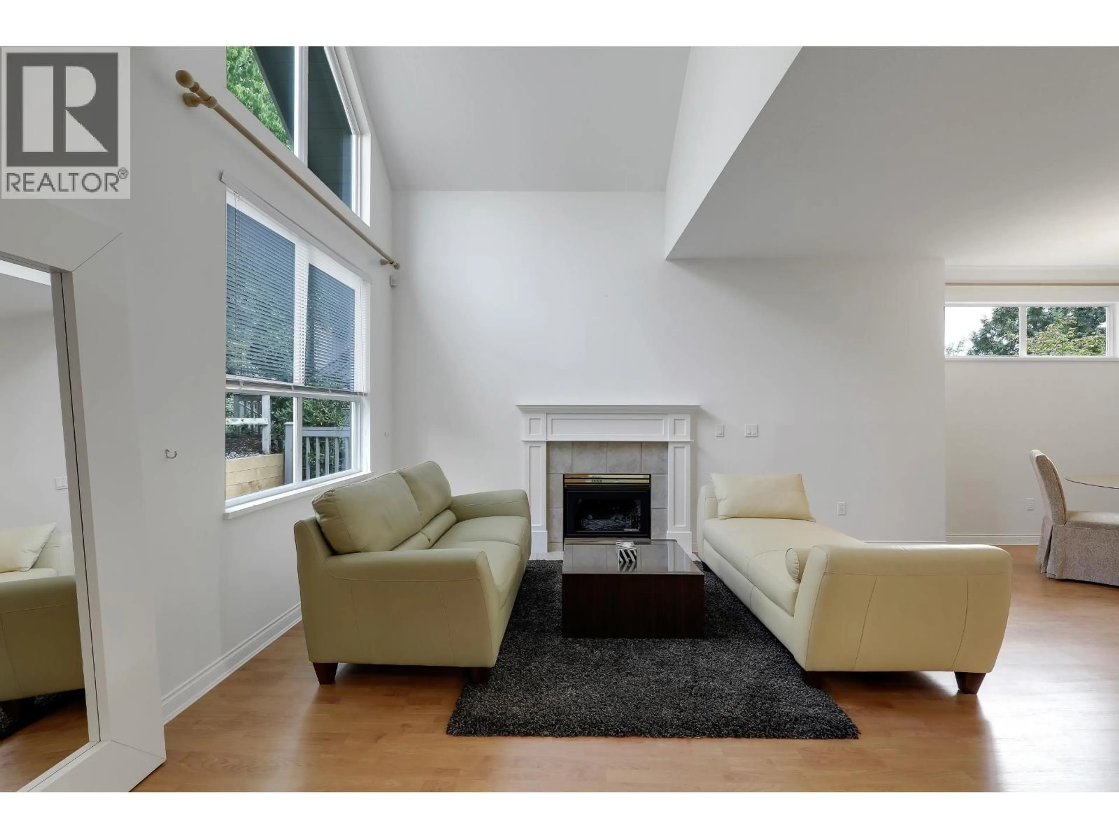 Living room with furniture, unknown for 220 - 1465 PARKWAY BOULEVARD, Coquitlam British Columbia V3E3E6