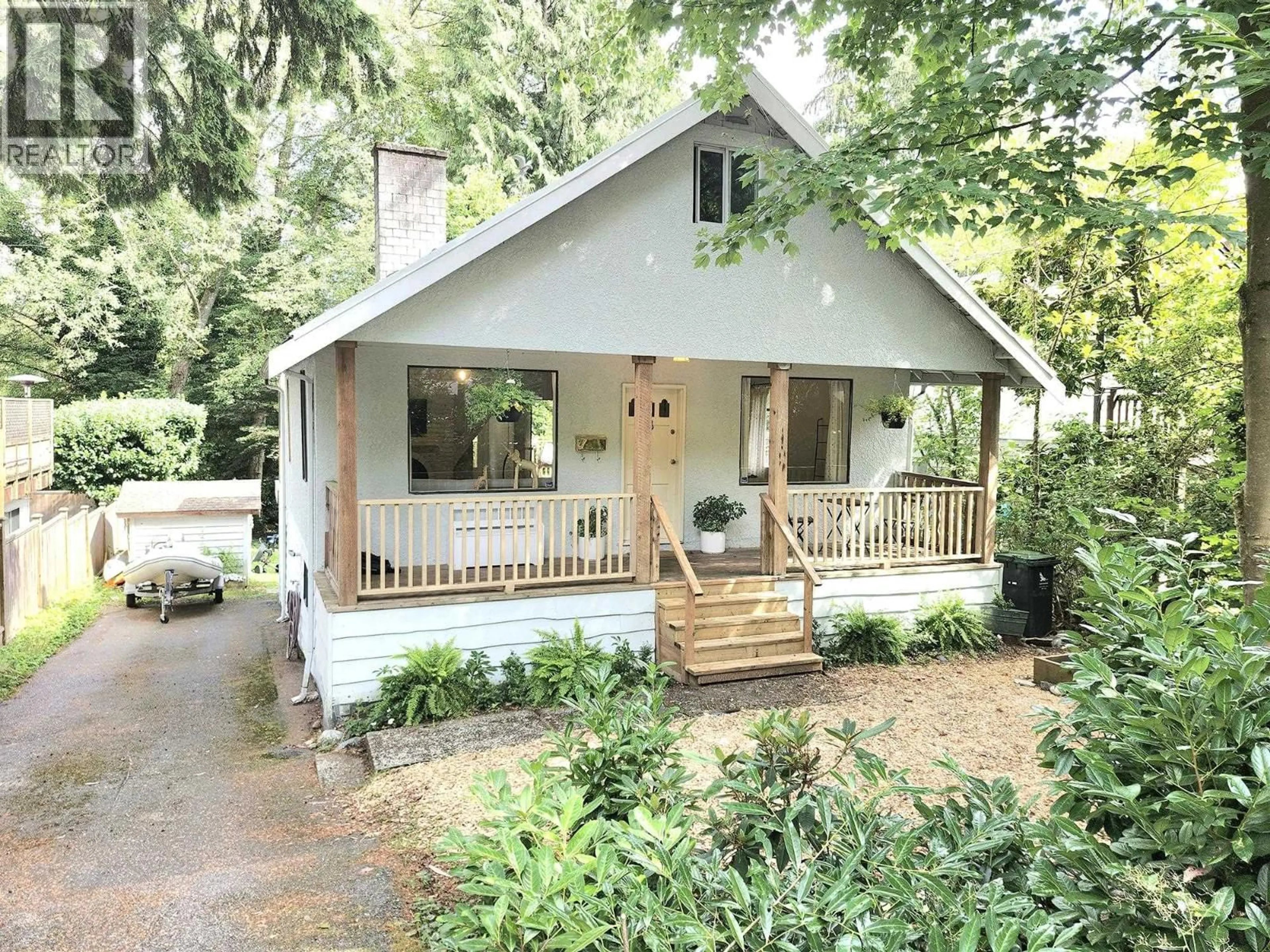 Home with vinyl exterior material, street for 1706 DEEP COVE ROAD, North Vancouver British Columbia V7G1S5
