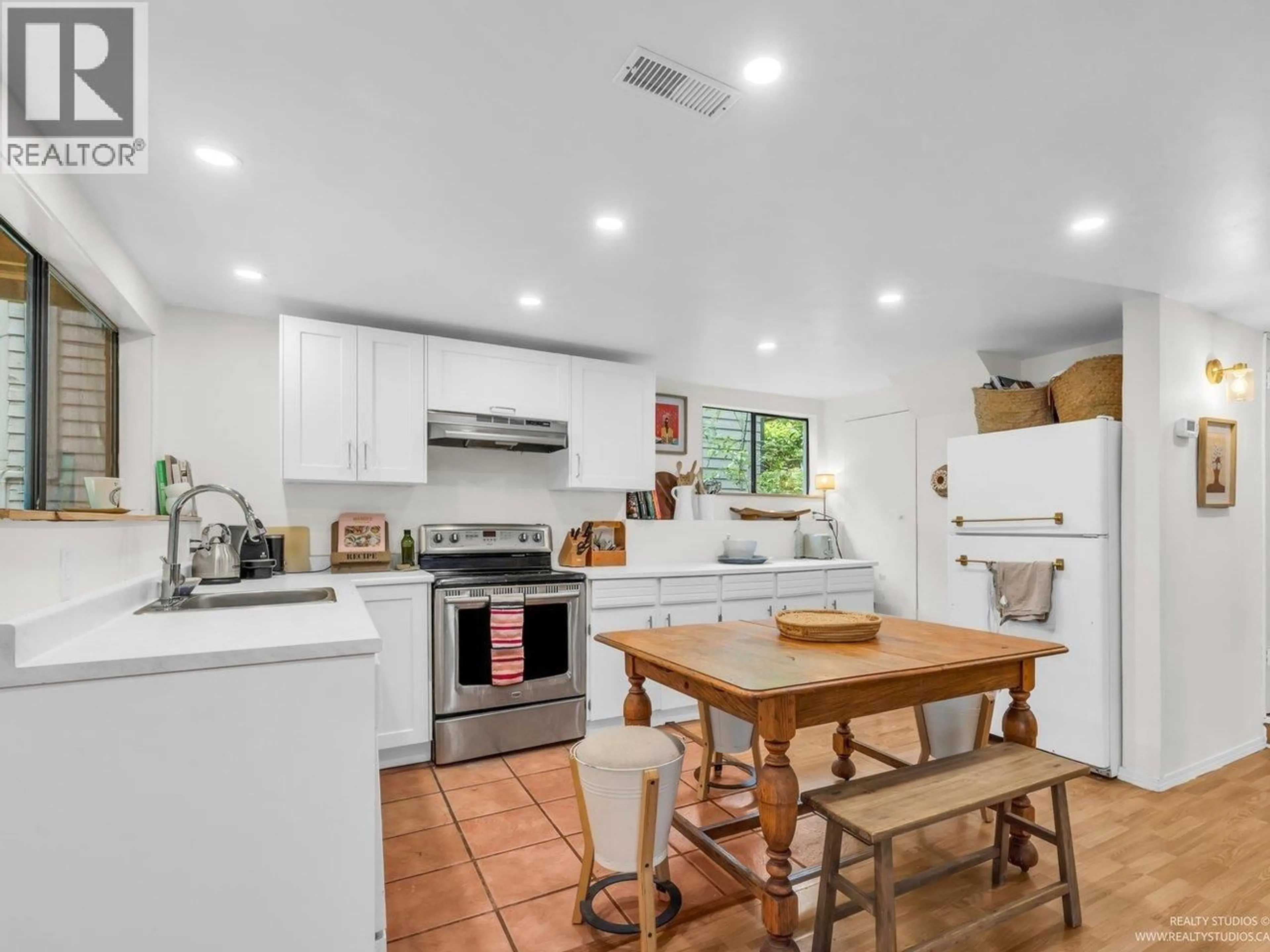 Open concept kitchen, ceramic/tile floor for 1706 DEEP COVE ROAD, North Vancouver British Columbia V7G1S5