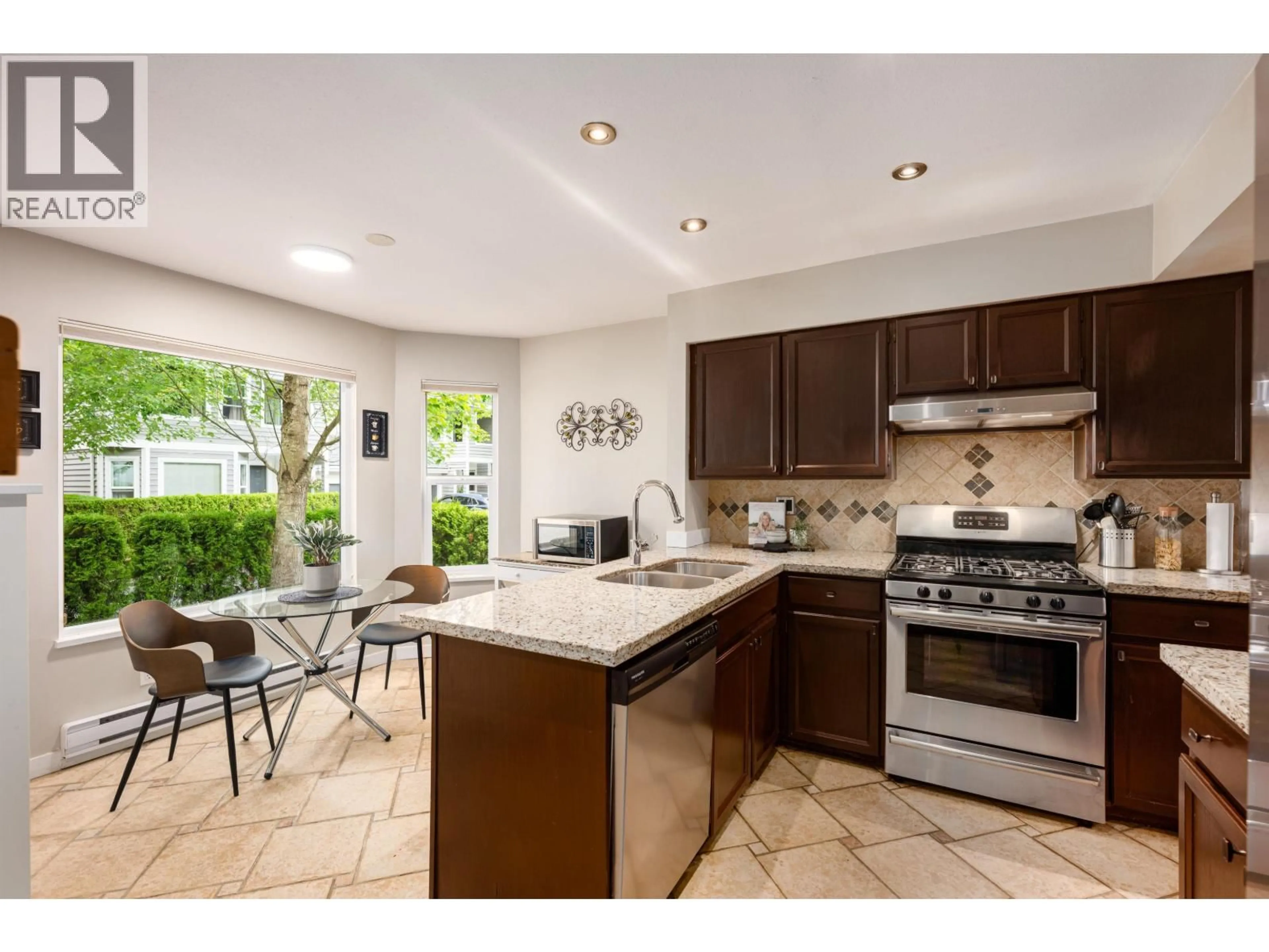 Open concept kitchen, ceramic/tile floor for 4 - 1135 LANSDOWNE DRIVE, Coquitlam British Columbia V3B7K6