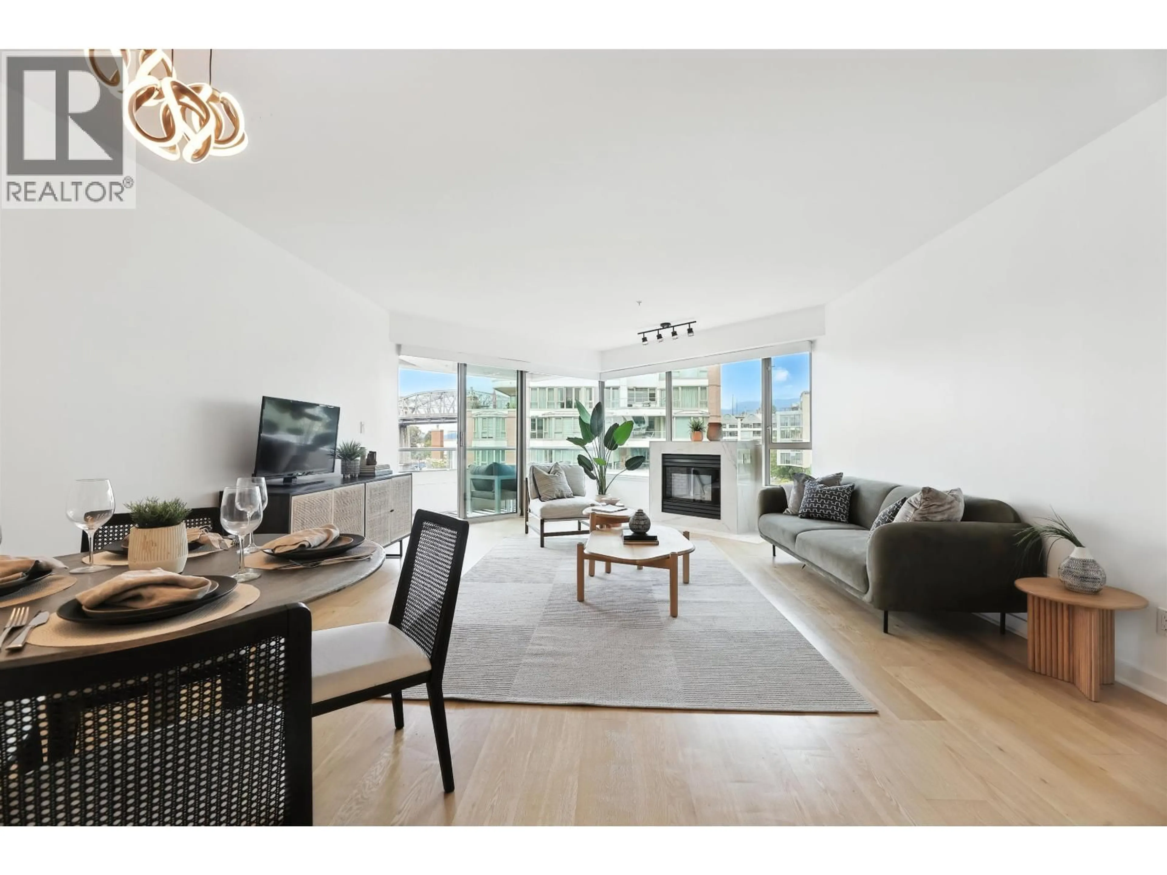 Living room with furniture, wood/laminate floor for 603 - 1600 HORNBY STREET, Vancouver British Columbia V6Z2S4