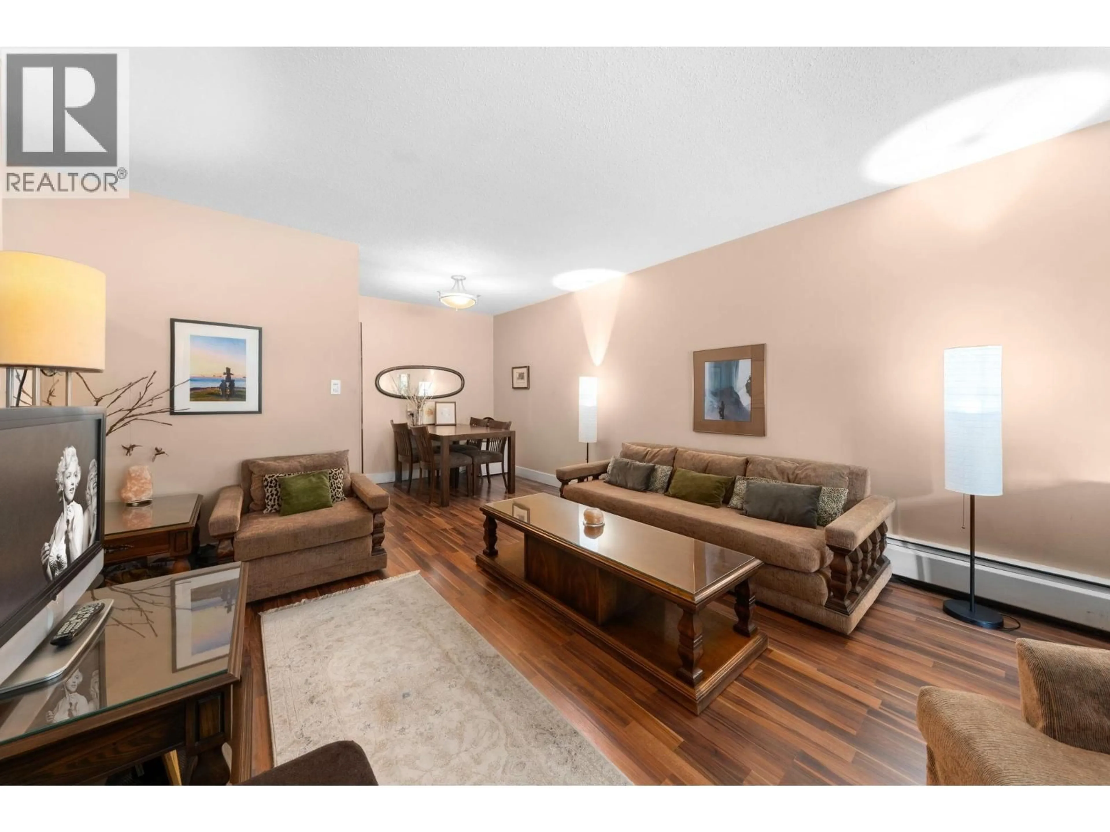 Living room with furniture, wood/laminate floor for 307 - 780 PREMIER STREET, North Vancouver British Columbia V7J2G8