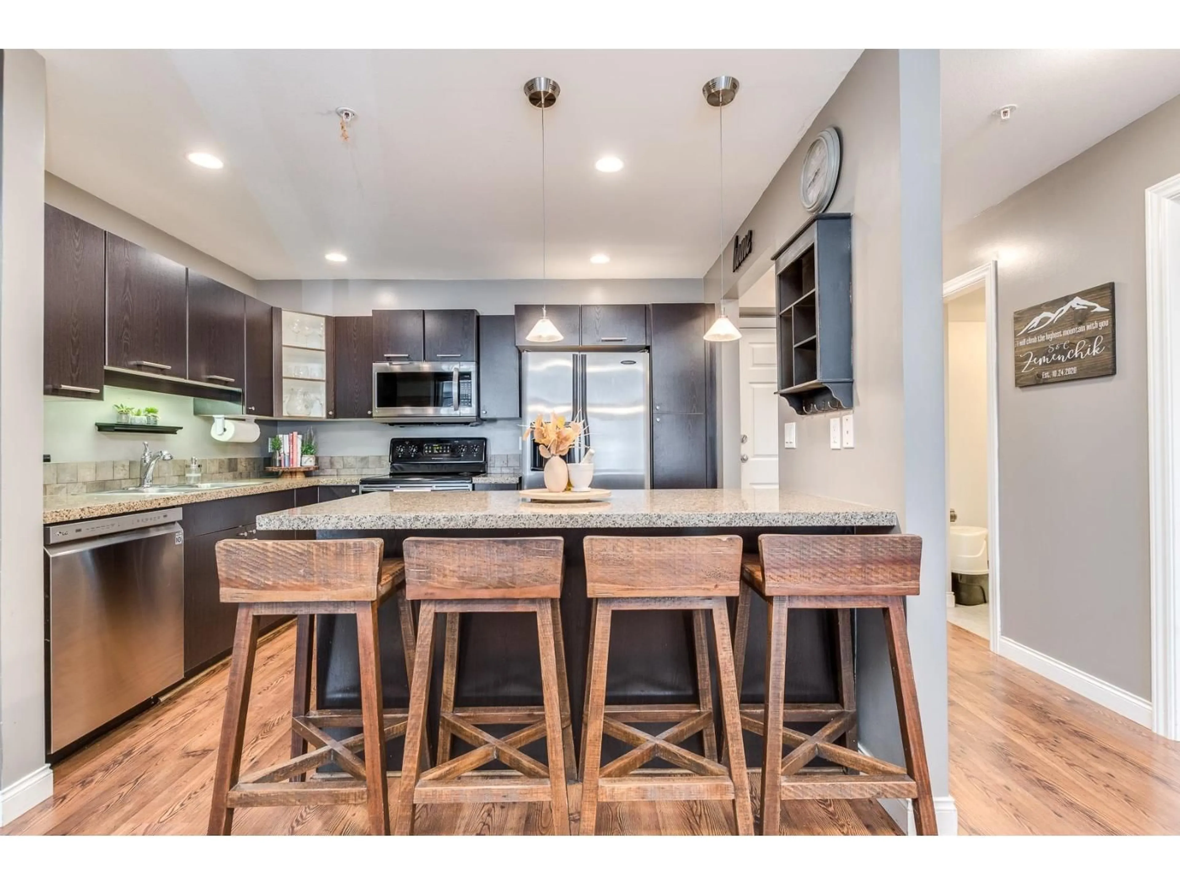 Open concept kitchen, wood/laminate floor for 114 - 5438 198, Langley British Columbia V3A1G2