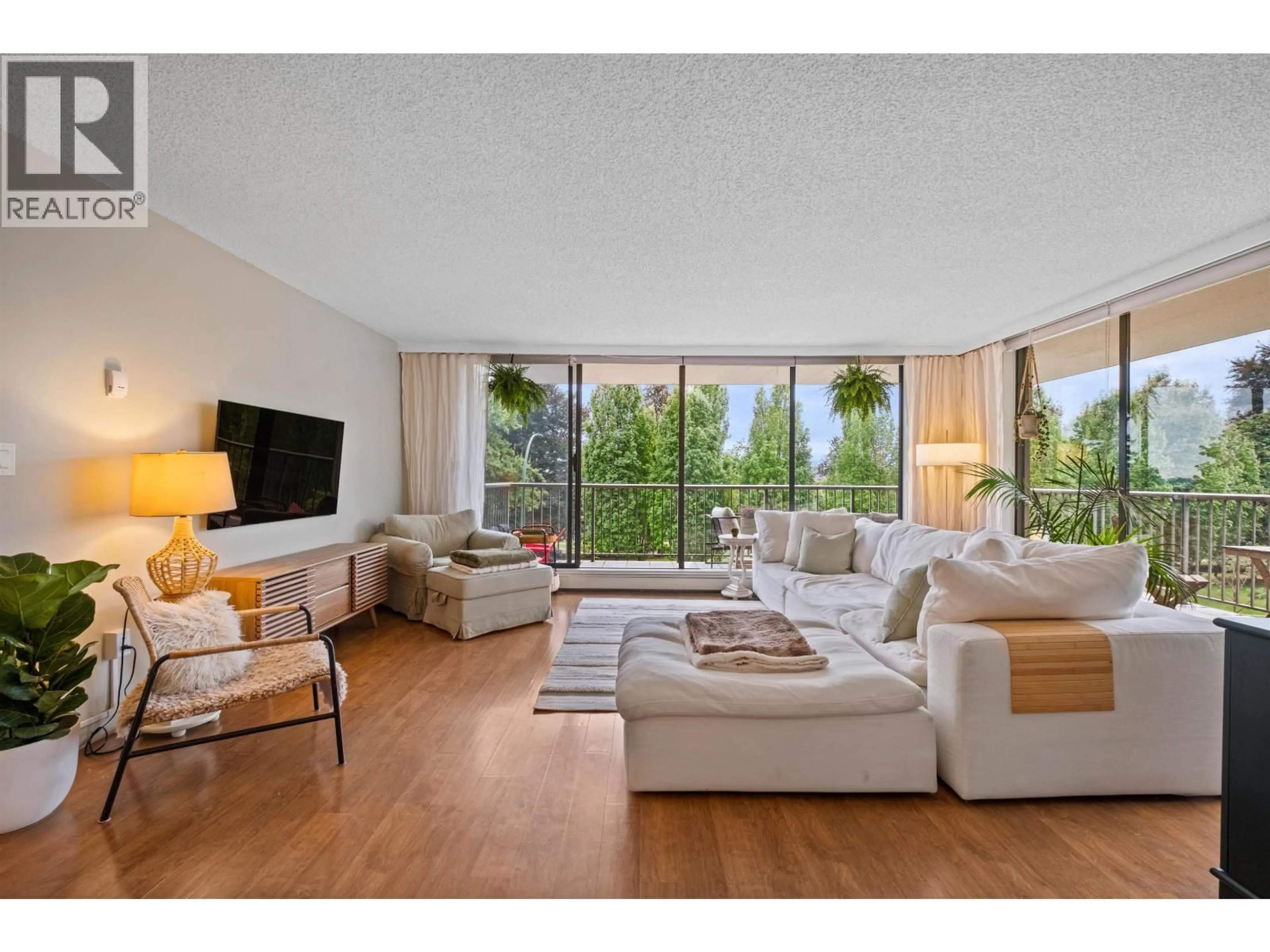 Living room with furniture, unknown for 201 - 140 KEITH ROAD, North Vancouver British Columbia V7L4M9