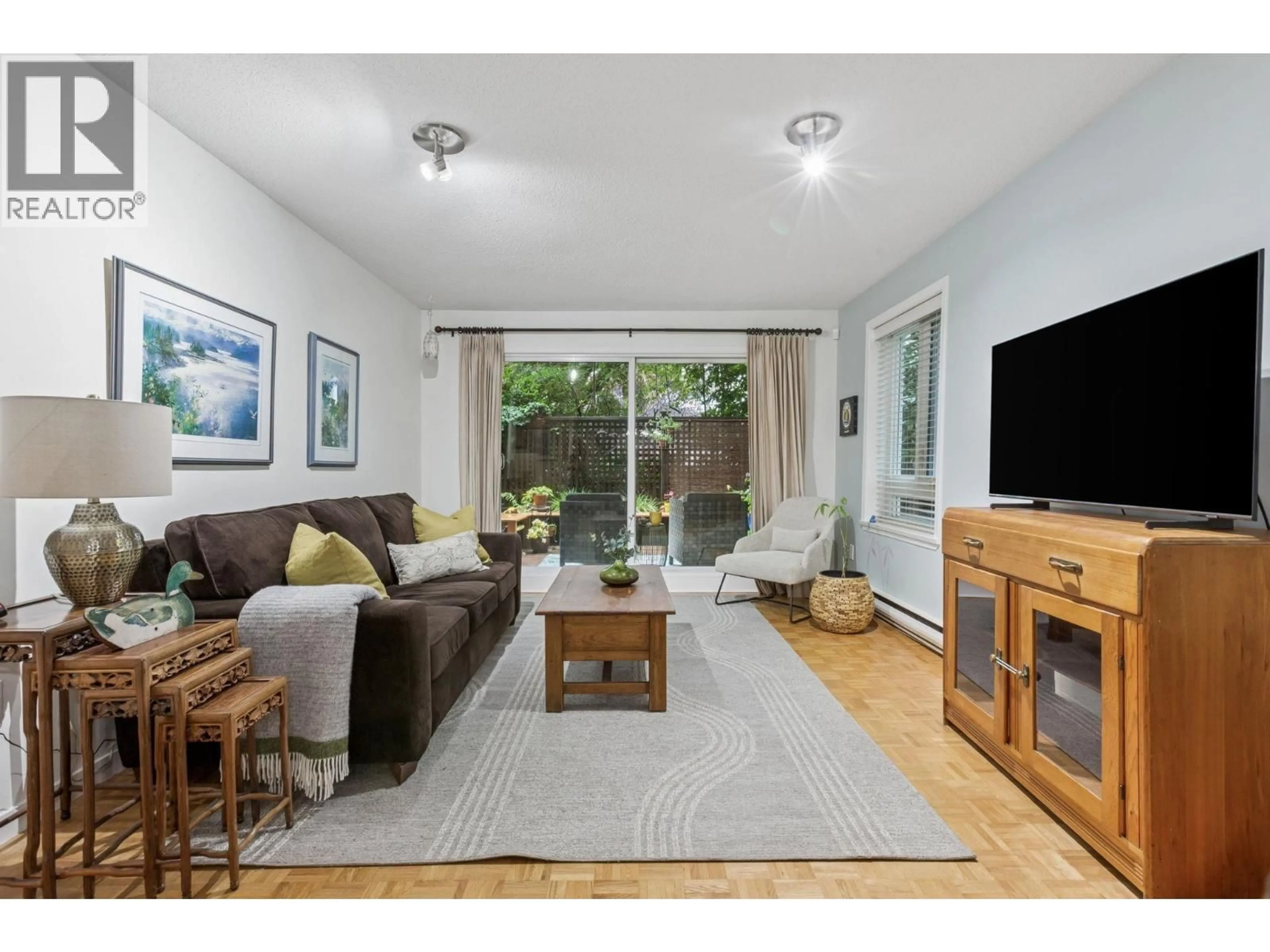 Living room with furniture, wood/laminate floor for 112 - 1429 4TH AVENUE, Vancouver British Columbia V5N1J6