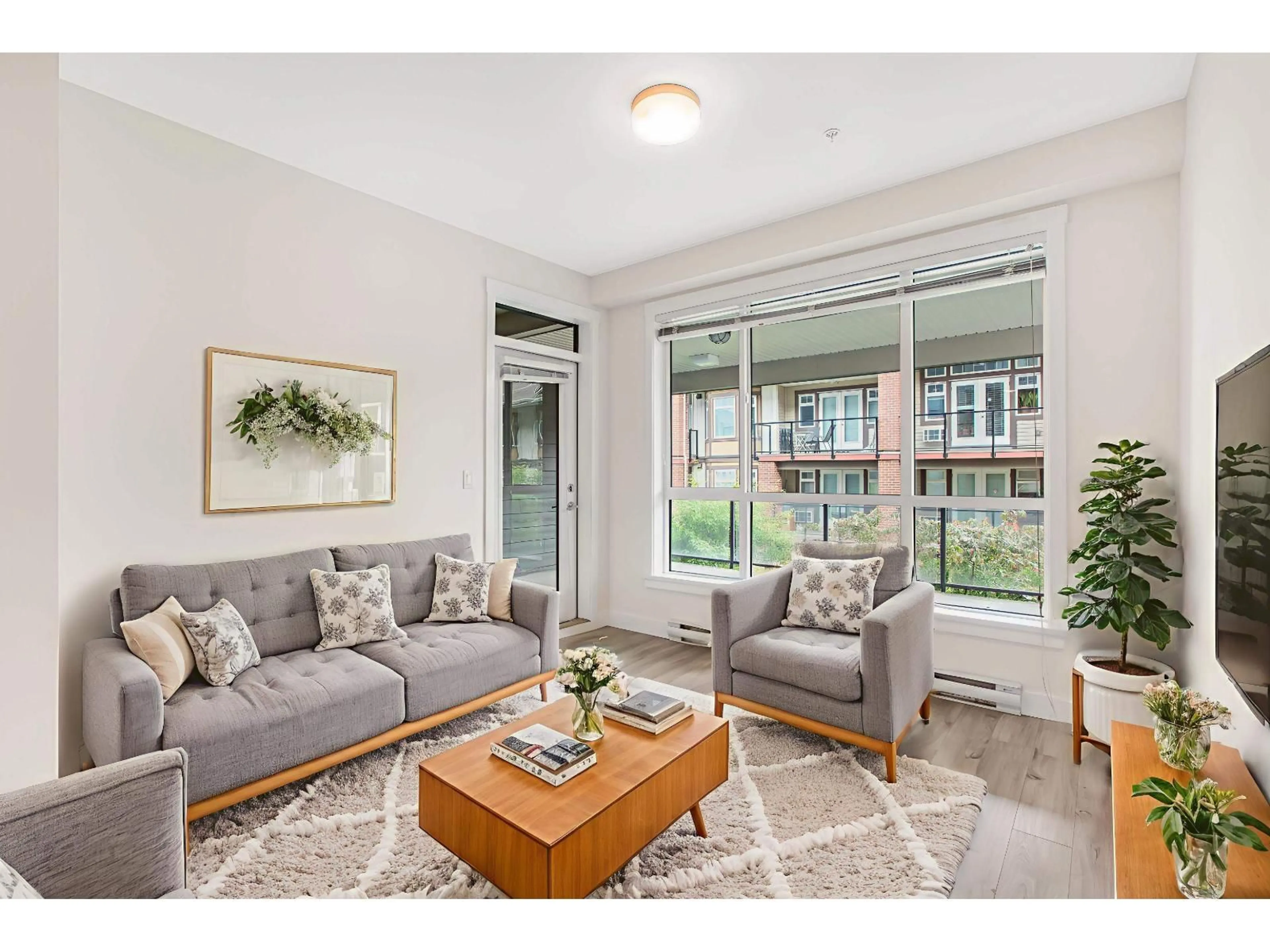 Living room with furniture, unknown for 313 - 5638 201A, Langley British Columbia V3A0L8