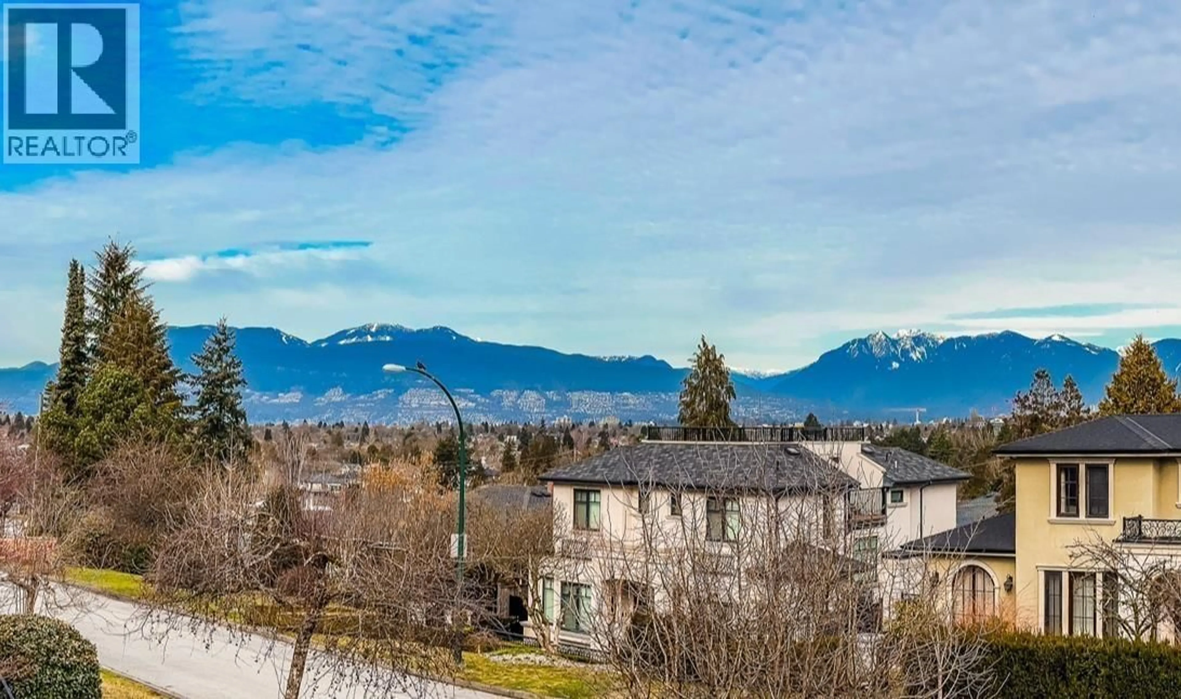 A pic from outside/outdoor area/front of a property/back of a property/a pic from drone, mountain view for 4807 PATON STREET, Vancouver British Columbia V6L2H9