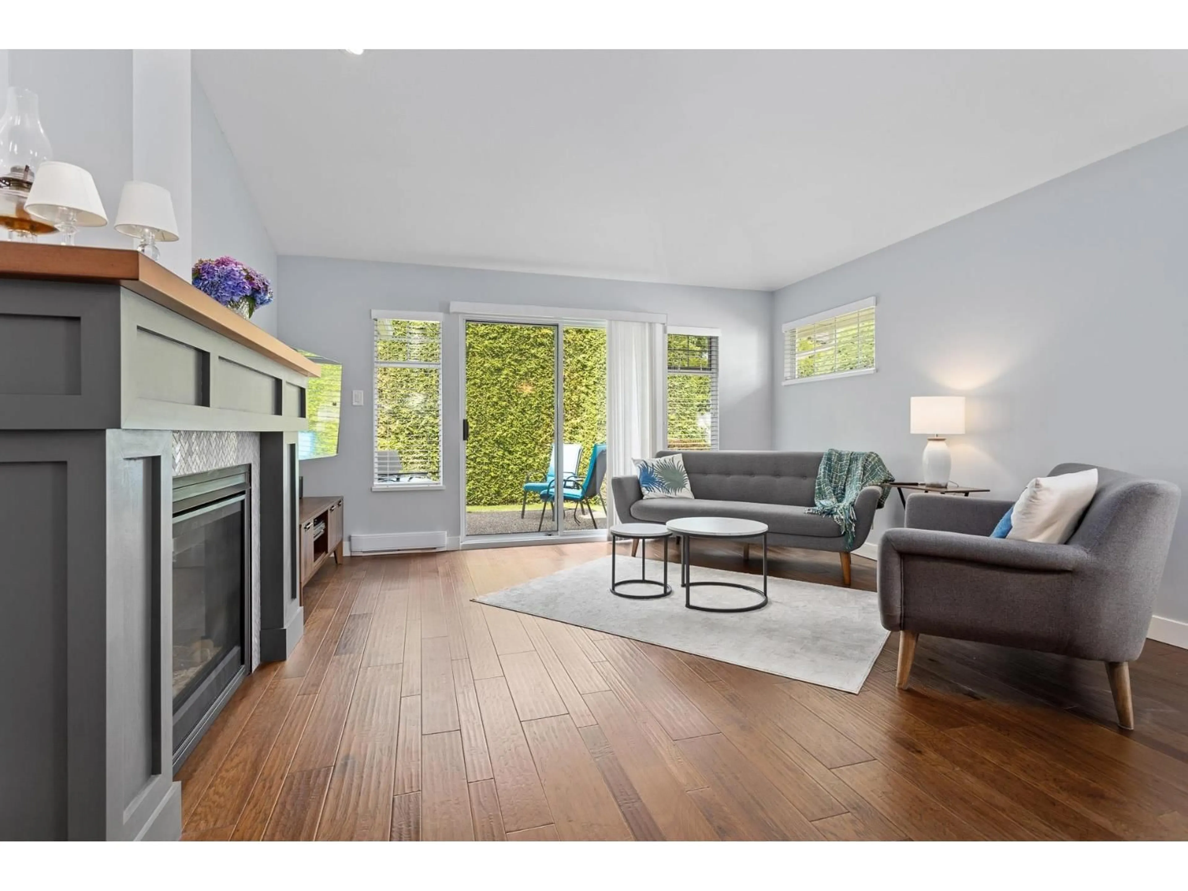 Living room with furniture, wood/laminate floor for 149 - 8737 212, Langley British Columbia V1M2C8