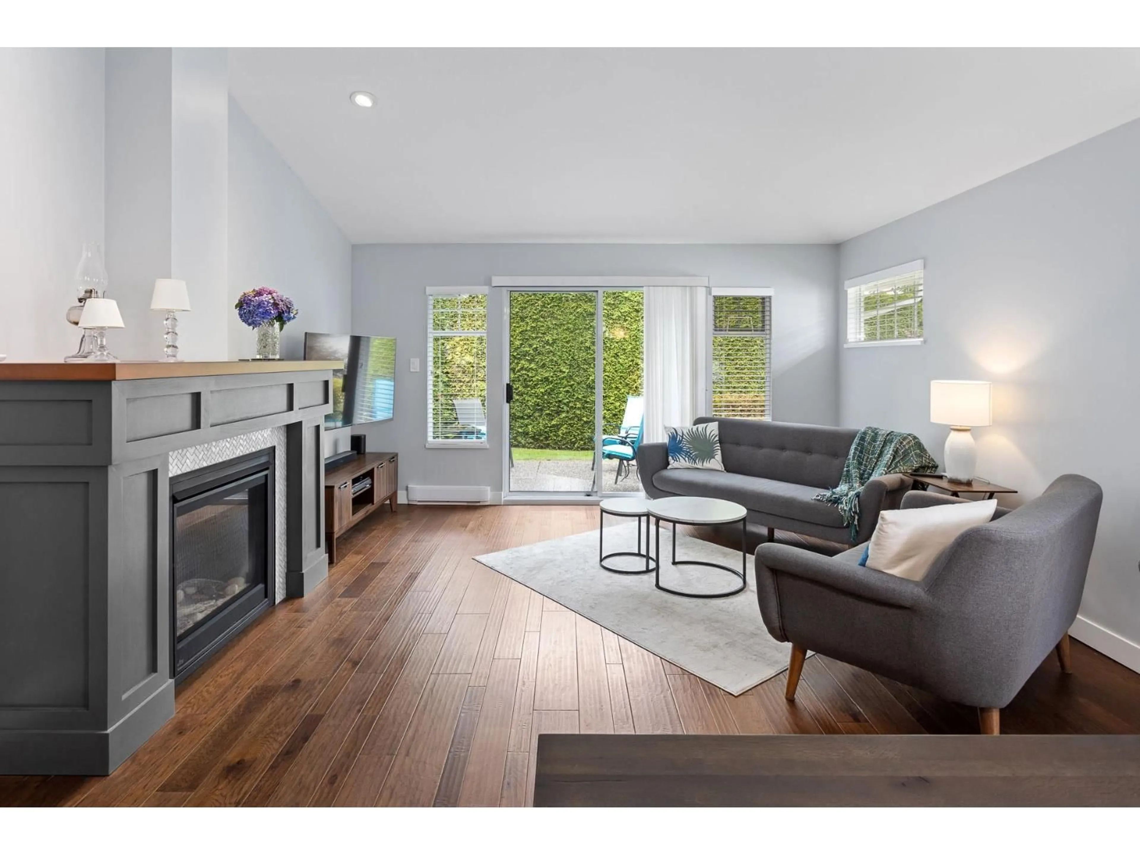 Living room with furniture, wood/laminate floor for 149 - 8737 212, Langley British Columbia V1M2C8