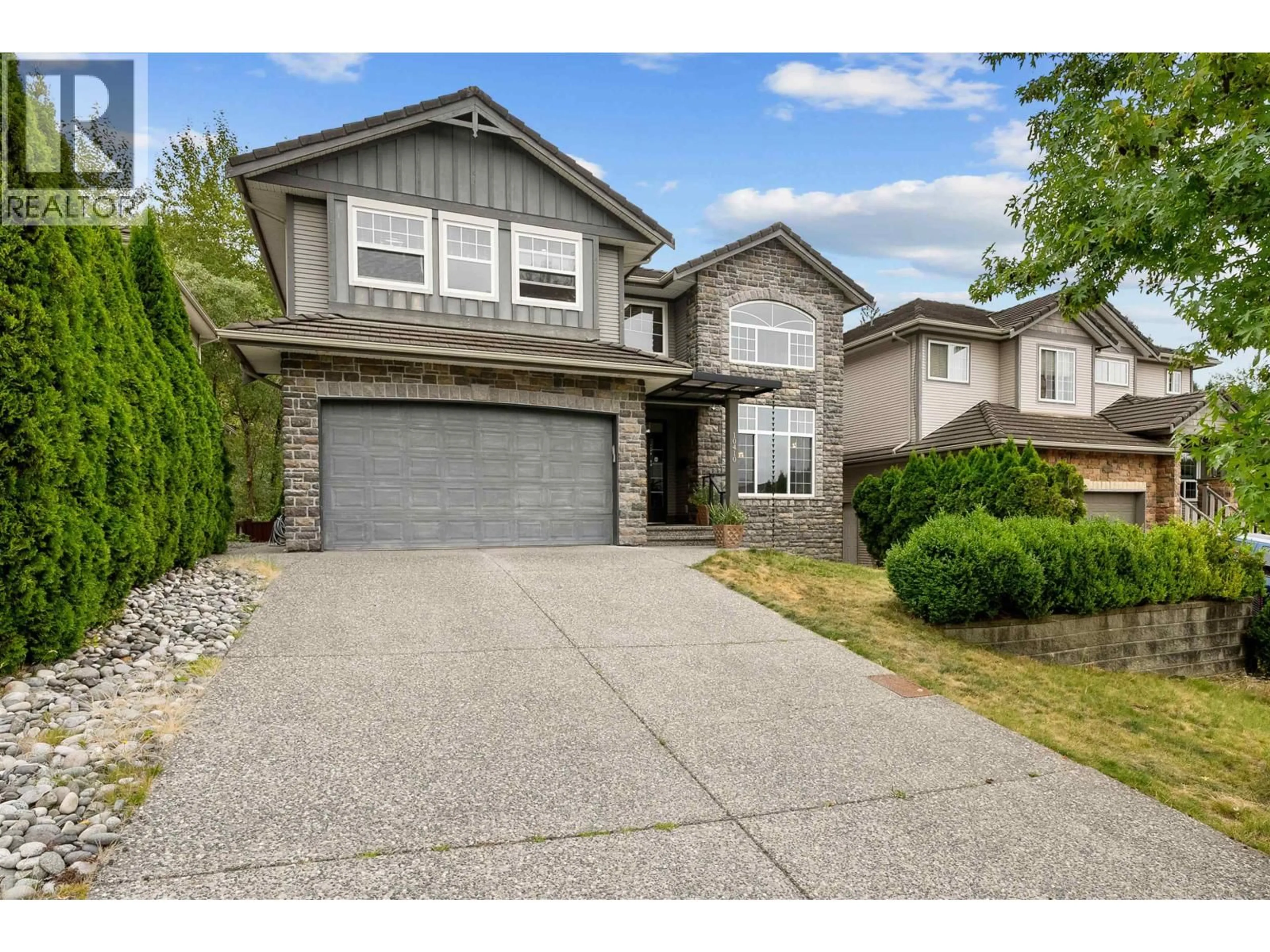 Home with vinyl exterior material, street for 10410 SLATFORD STREET, Maple Ridge British Columbia V2W1G3