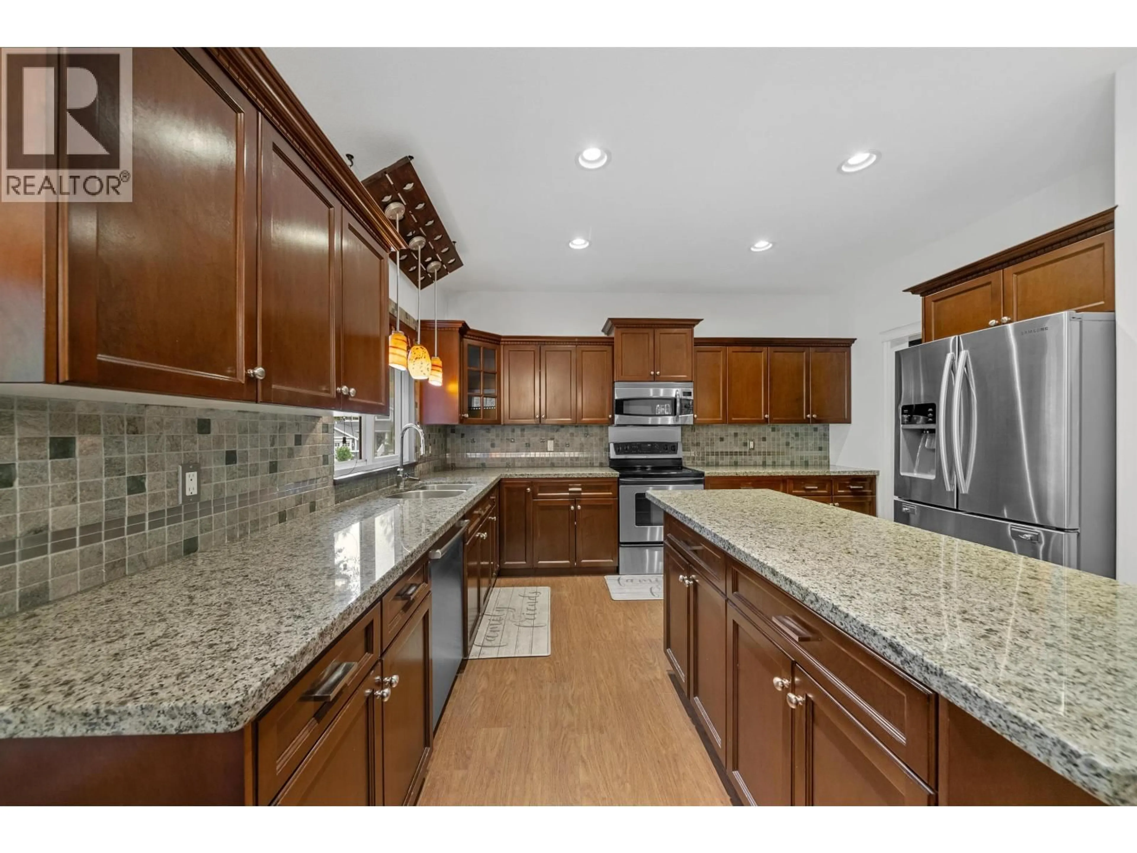 Open concept kitchen, ceramic/tile floor for 10410 SLATFORD STREET, Maple Ridge British Columbia V2W1G3