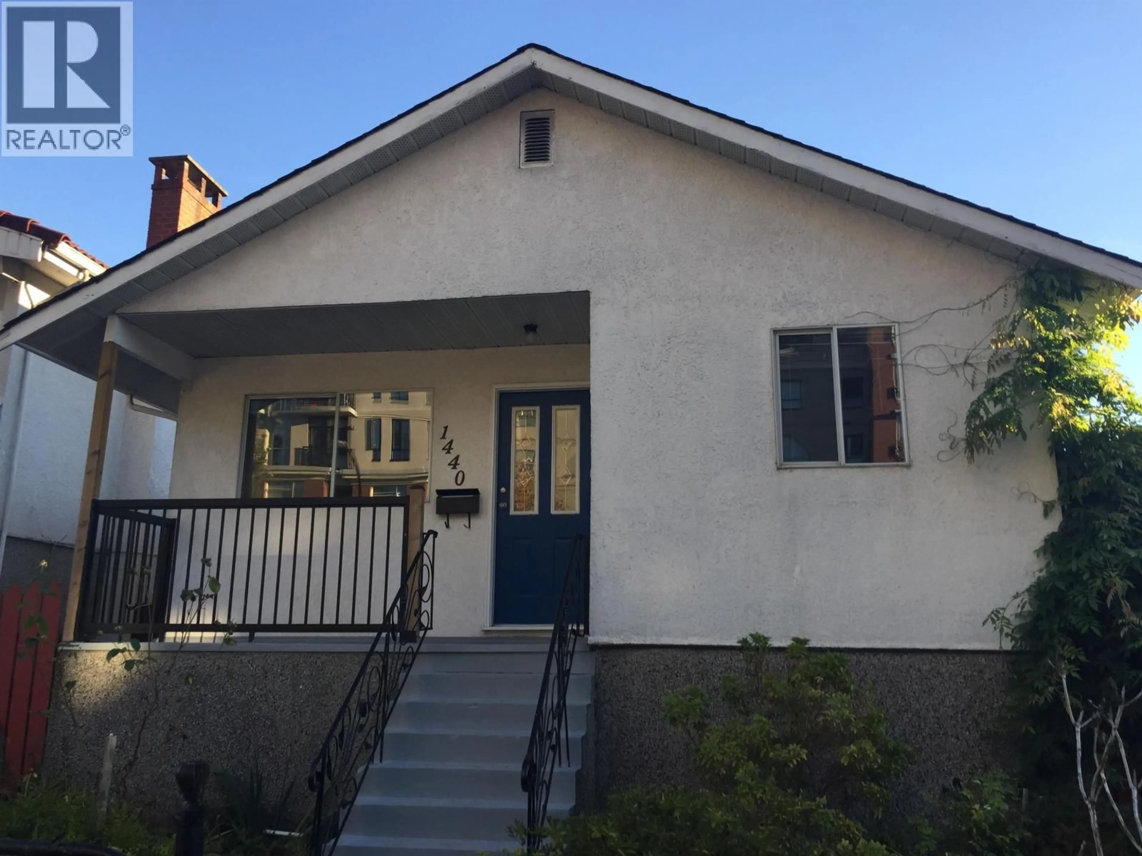 Home with vinyl exterior material, street for 1440 KING EDWARD AVENUE, Vancouver British Columbia V5N2V4