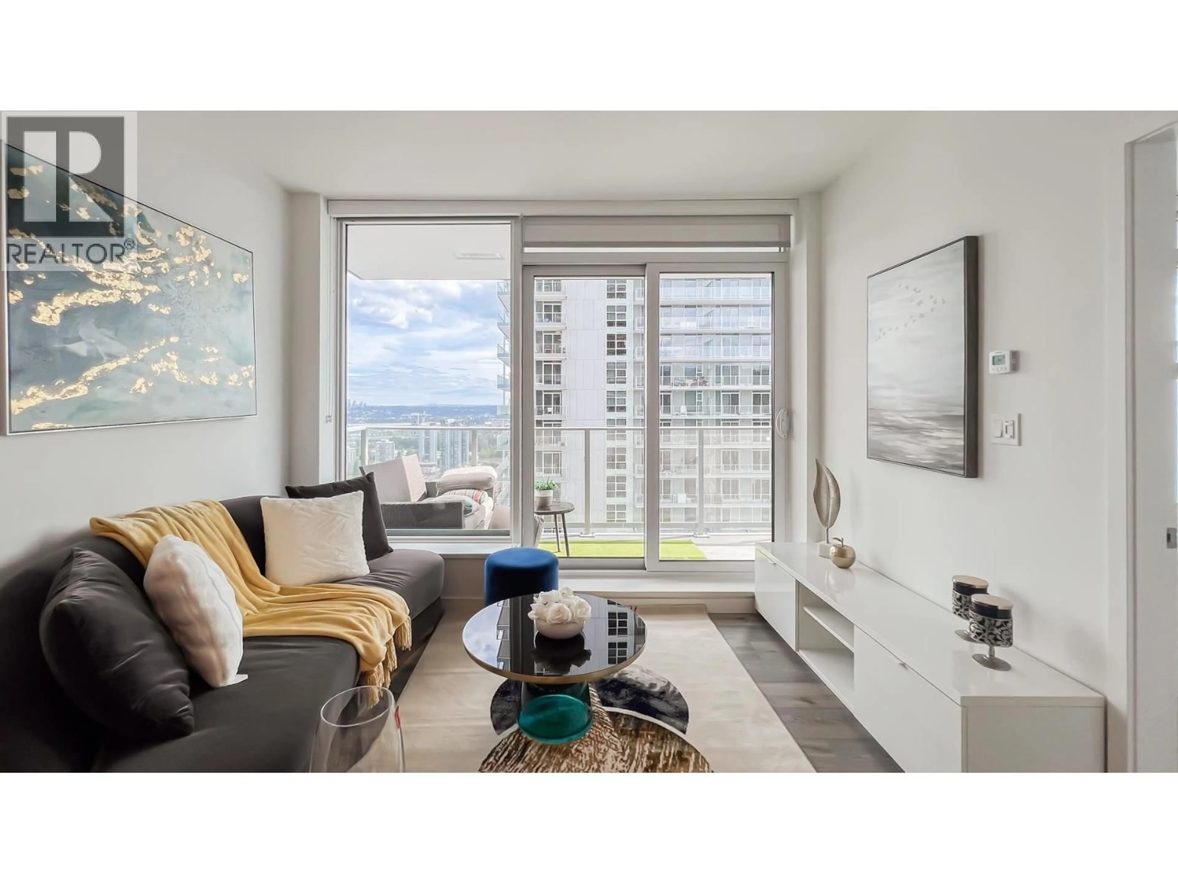 Living room with furniture, wood/laminate floor for 3106 - 3809 EVERGREEN PLACE, Burnaby British Columbia V3J0M1