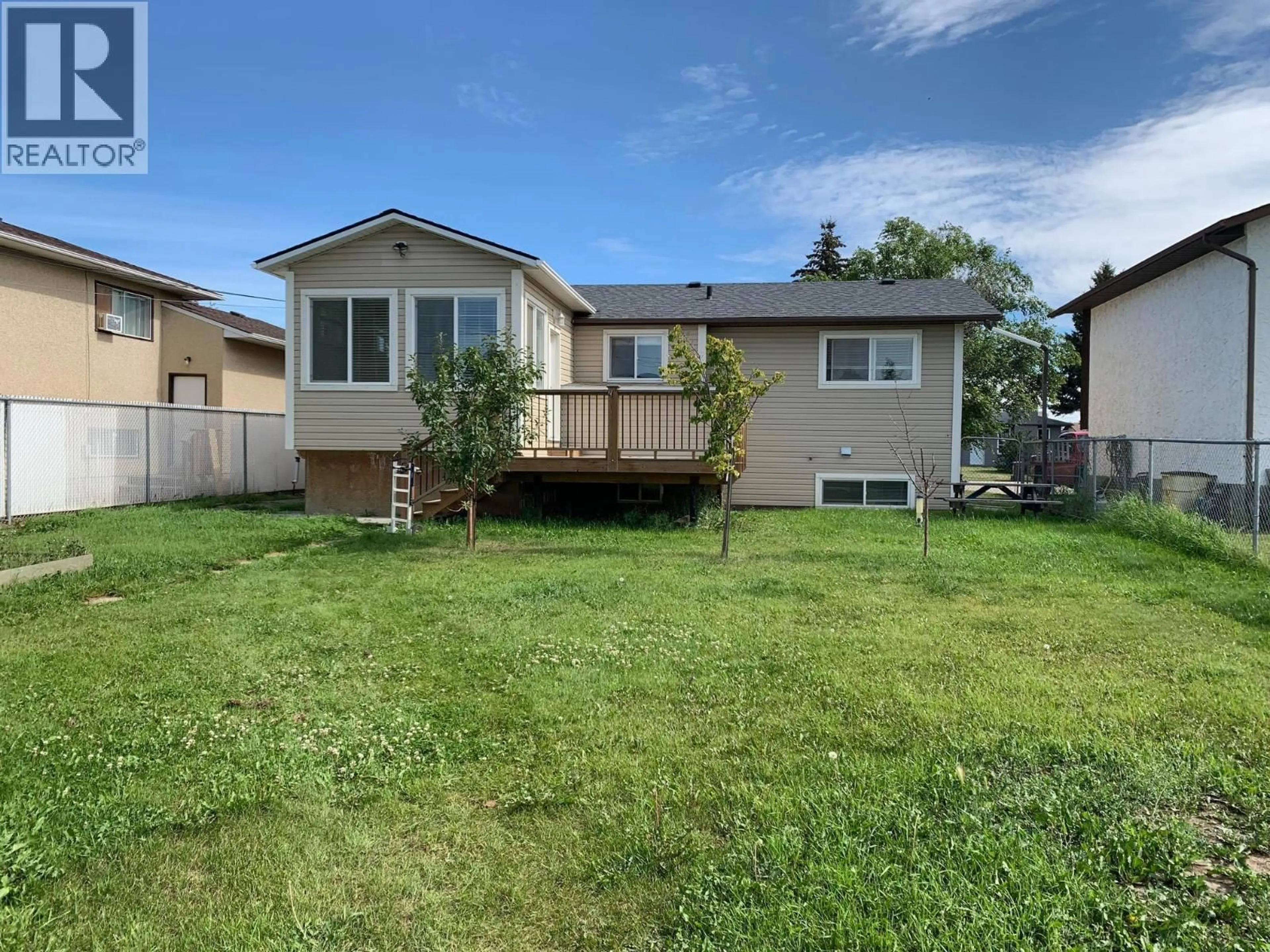 Home with vinyl exterior material, street for 8608 88 STREET, Fort St. John British Columbia V1J6B3