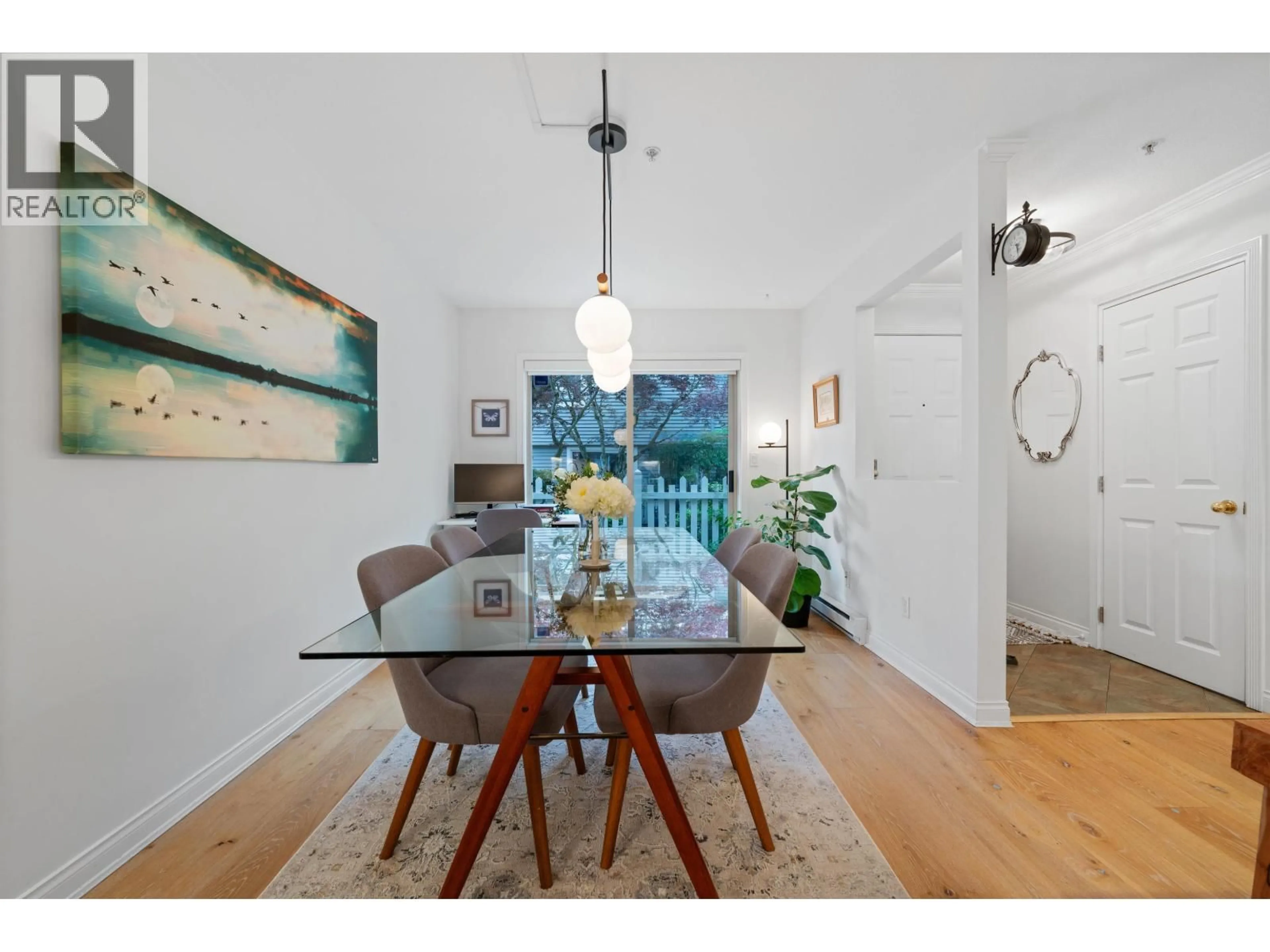Dining room, wood/laminate floor for 10 - 222 5TH STREET, North Vancouver British Columbia V7L1L7
