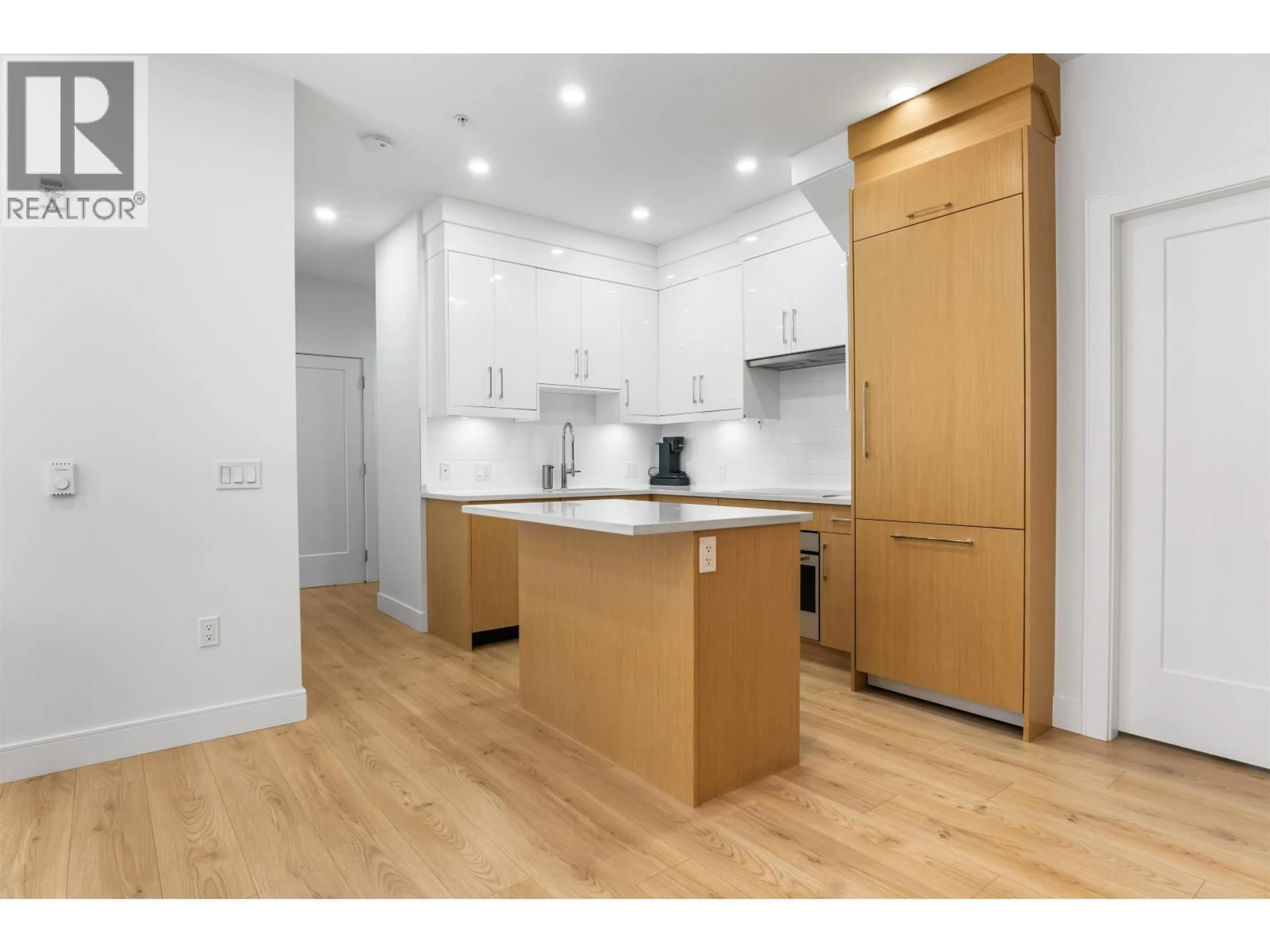 Open concept kitchen, wood/laminate floor for 106 - 7131 17TH AVENUE, Burnaby British Columbia V3N1K8