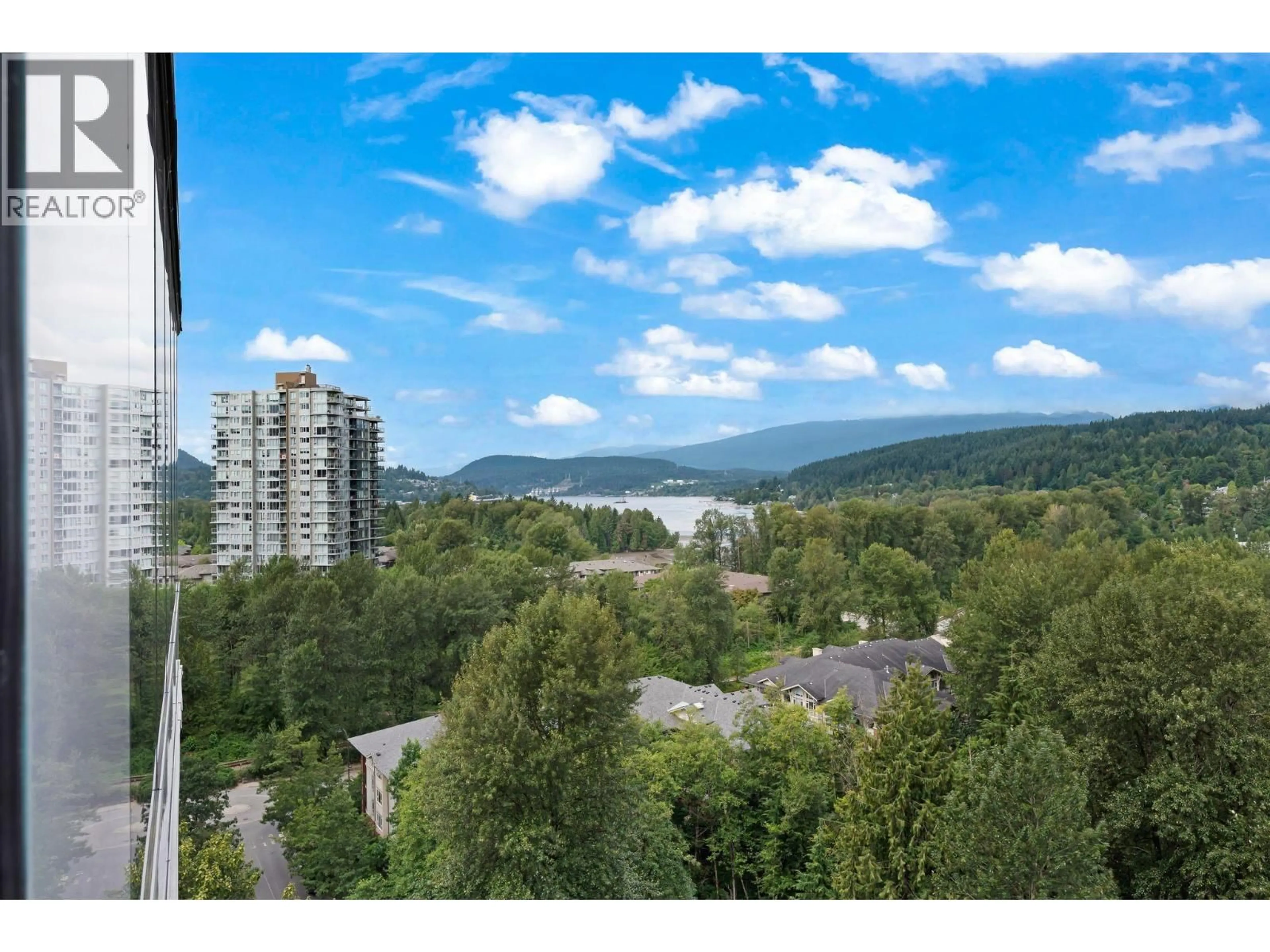 A pic from outside/outdoor area/front of a property/back of a property/a pic from drone, water/lake/river/ocean view for 1509 - 305 MORRISSEY ROAD, Port Moody British Columbia V3H0M3
