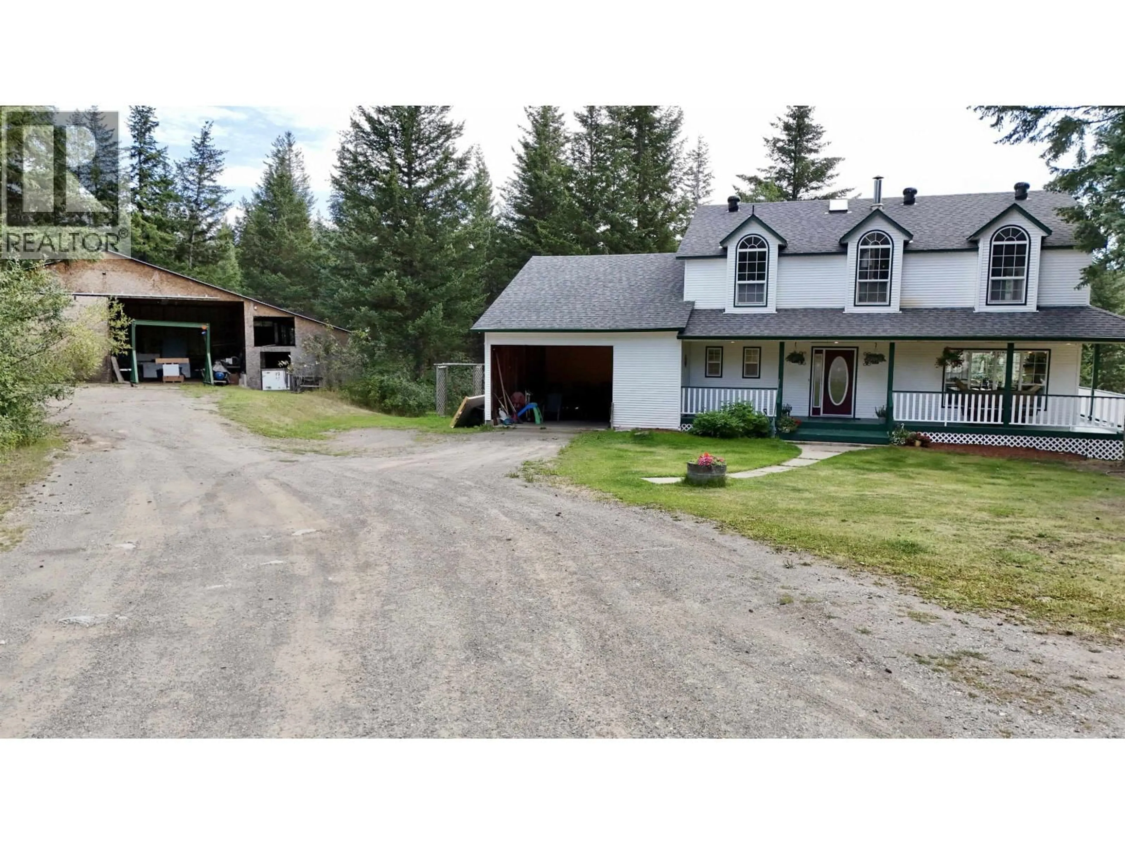 A pic from outside/outdoor area/front of a property/back of a property/a pic from drone, unknown for 3448 SPOKIN LAKE ROAD, 150 Mile House British Columbia V0K2G0