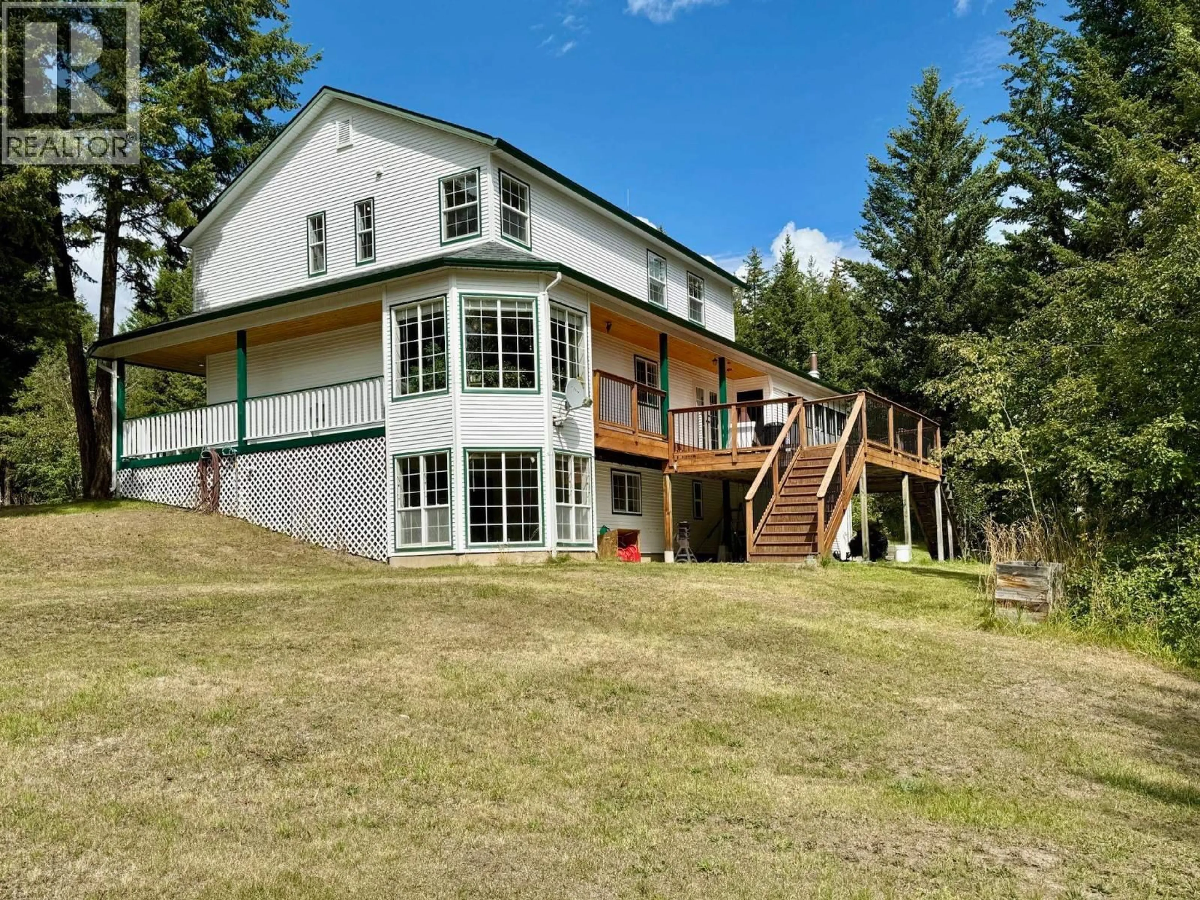 A pic from outside/outdoor area/front of a property/back of a property/a pic from drone, mountain view for 3448 SPOKIN LAKE ROAD, 150 Mile House British Columbia V0K2G0
