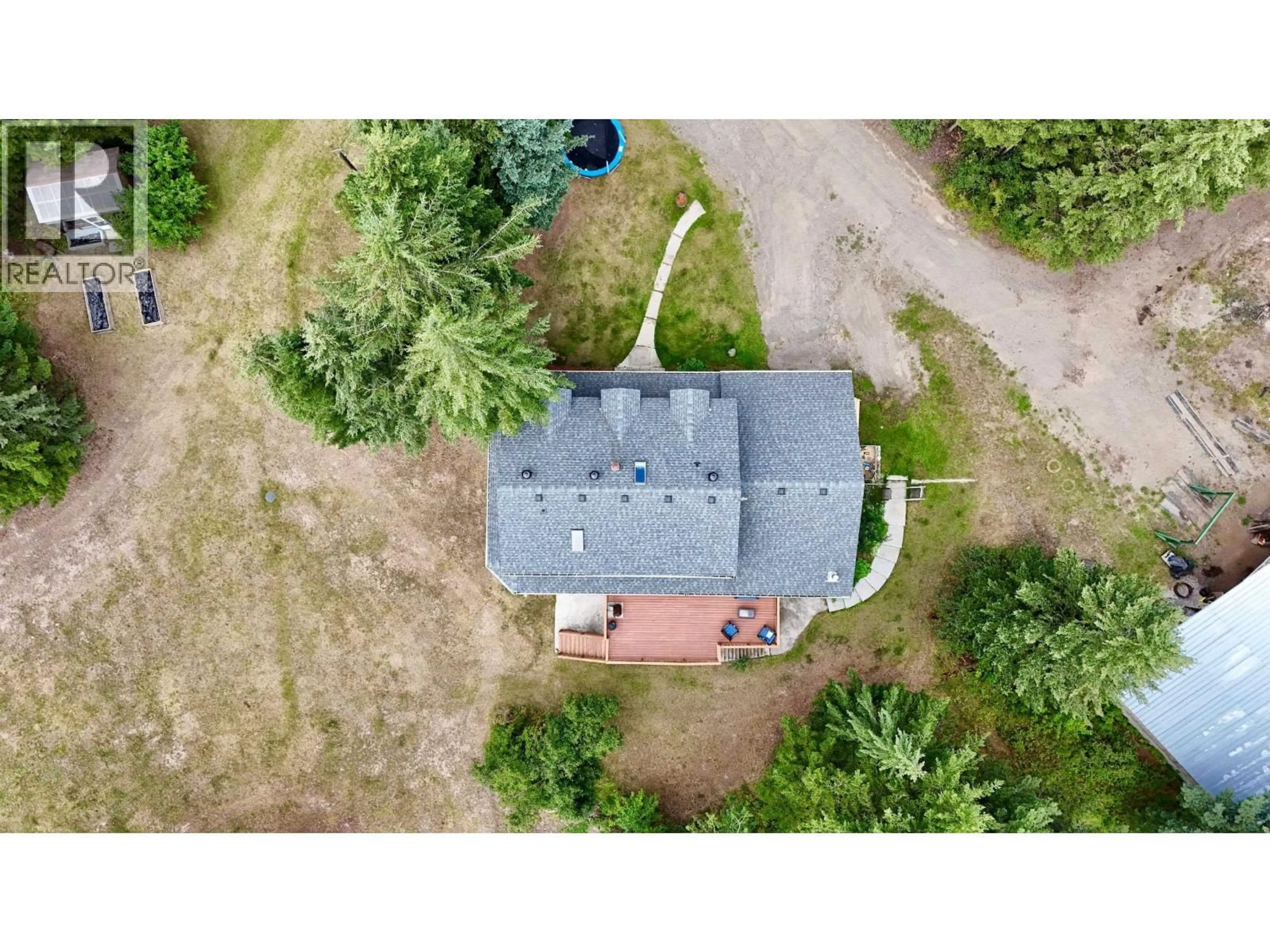 A pic from outside/outdoor area/front of a property/back of a property/a pic from drone, building for 3448 SPOKIN LAKE ROAD, 150 Mile House British Columbia V0K2G0
