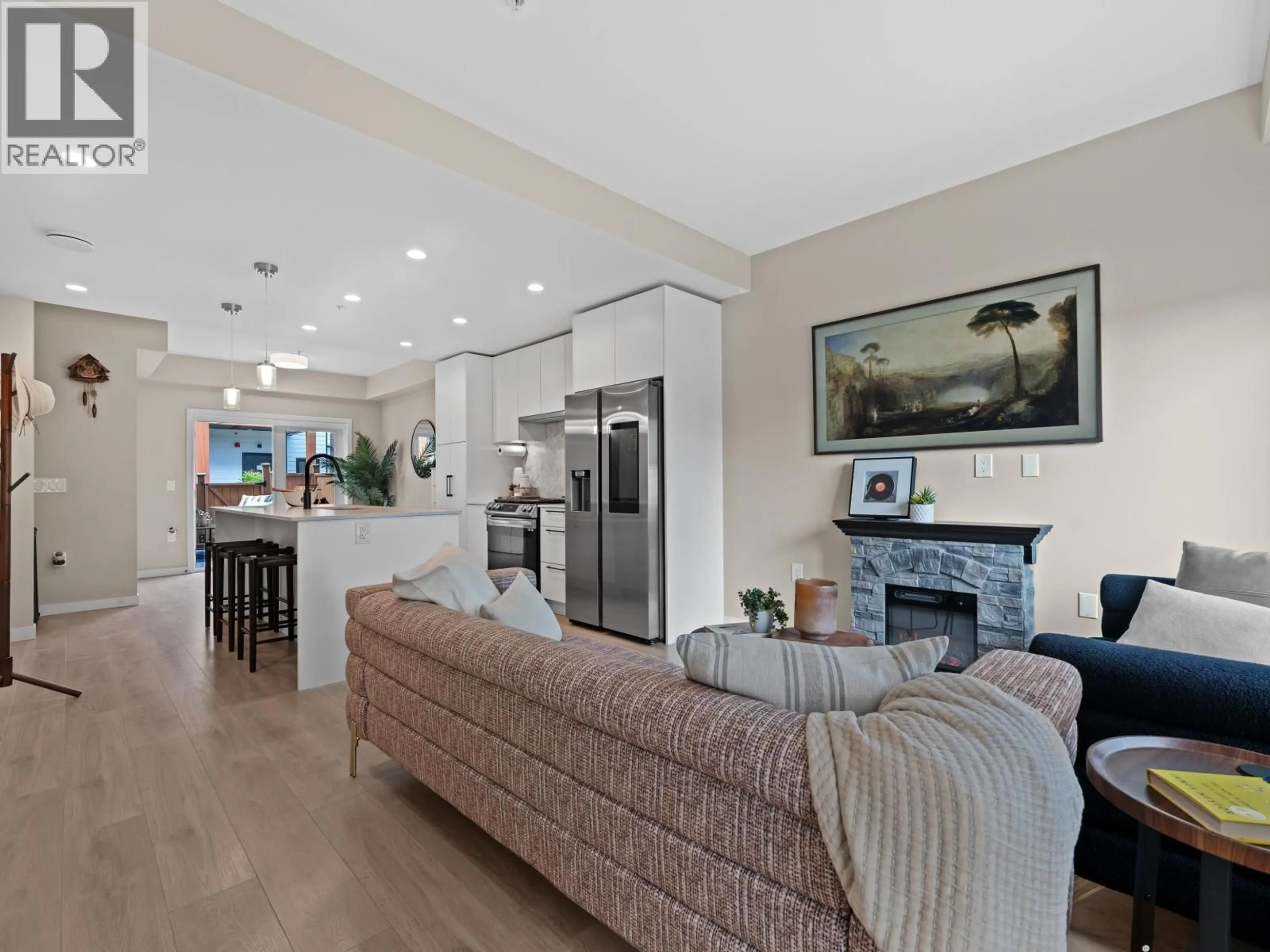 Living room with furniture, unknown for 161 - 565 2ND STREET, North Vancouver British Columbia V7L1E1