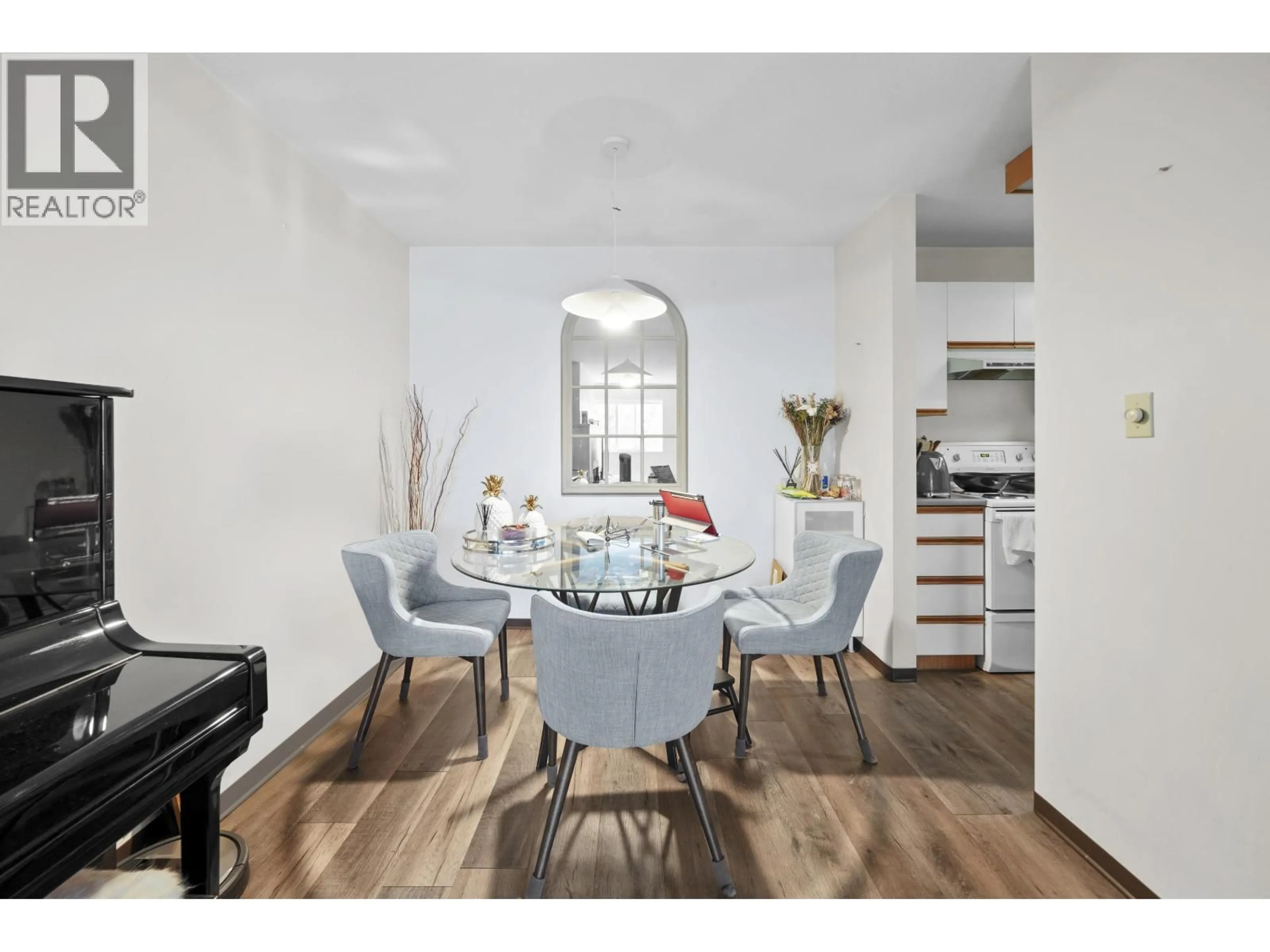Dining room, wood/laminate floor for 204 - 7431 BLUNDELL ROAD, Richmond British Columbia V6Y3G8