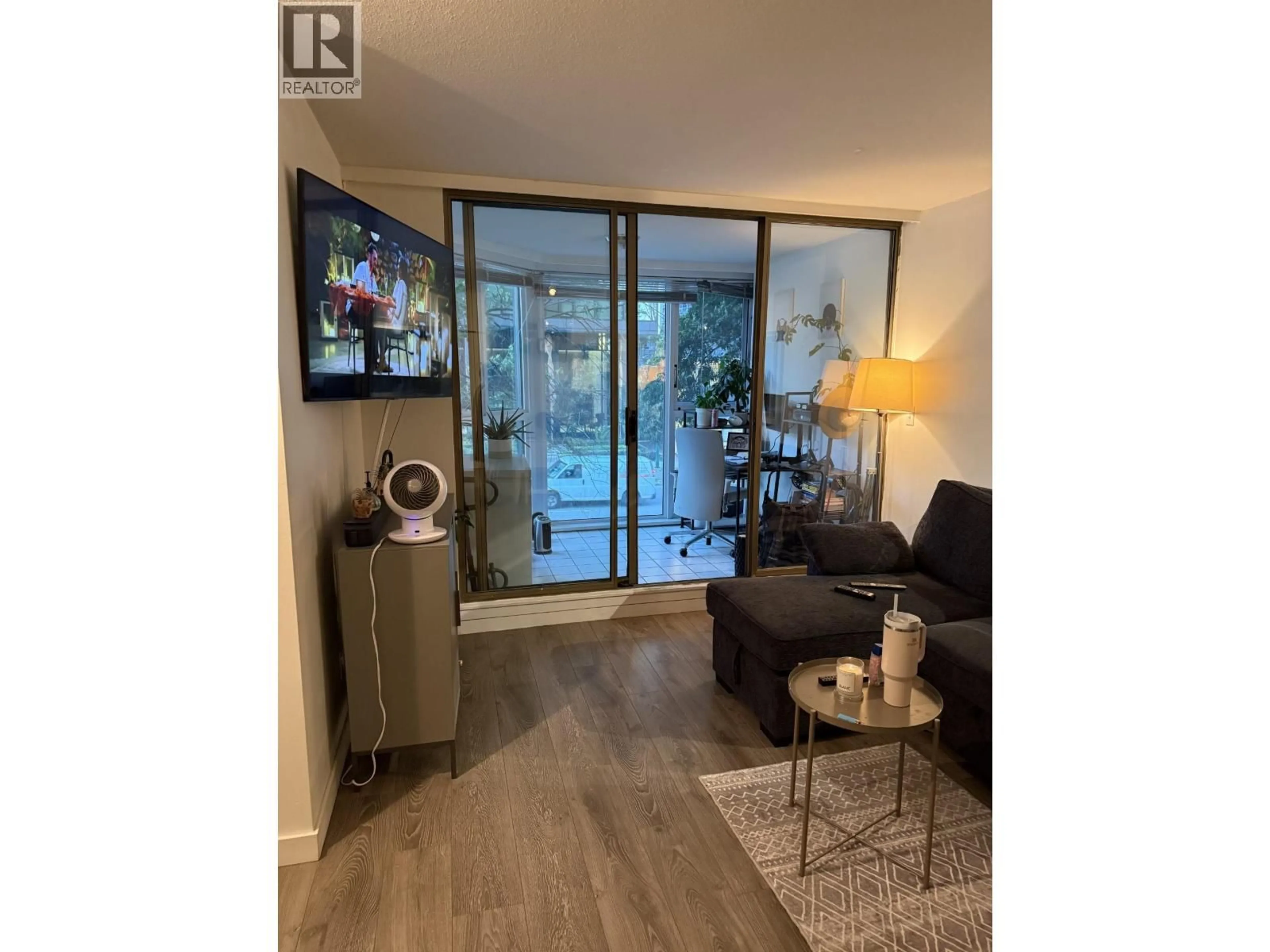 Living room with furniture, wood/laminate floor for 305 - 888 PACIFIC AVENUE, Vancouver British Columbia V6Z2S6