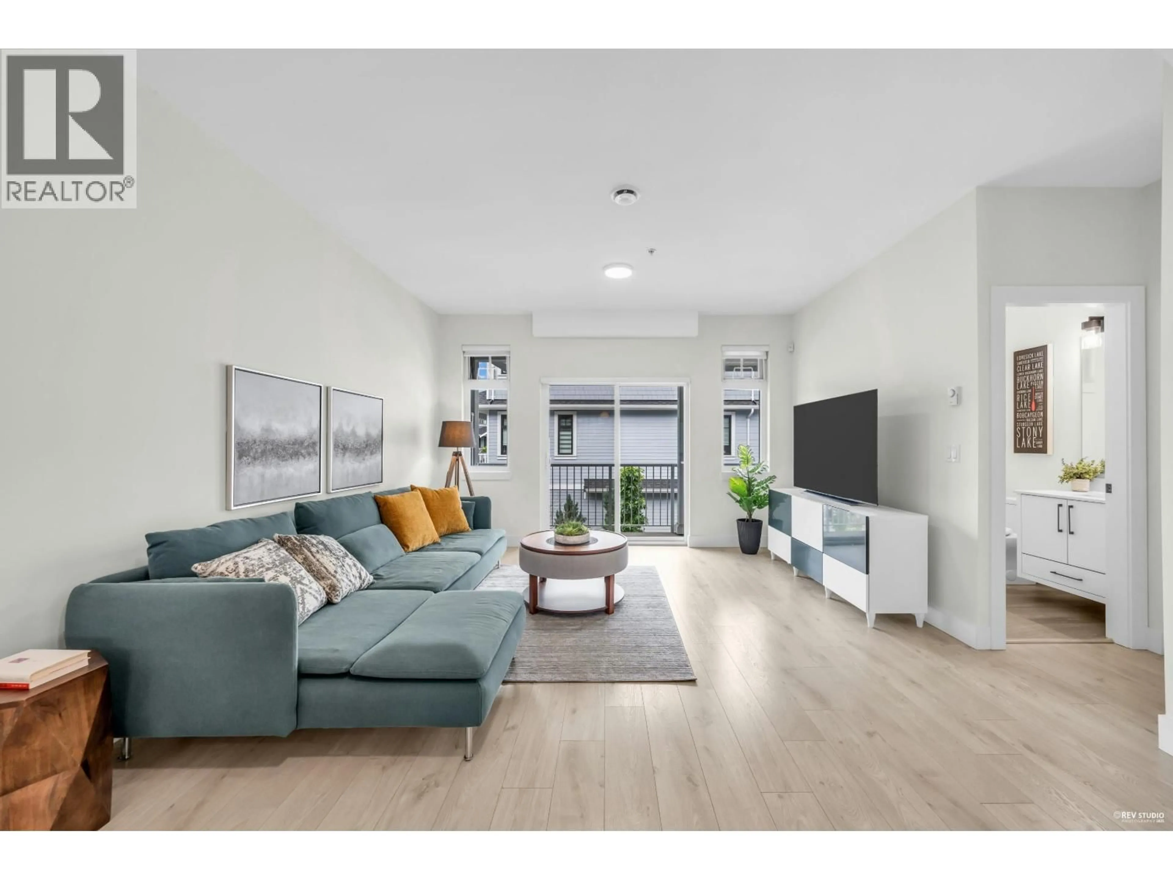 Living room with furniture, wood/laminate floor for 30 - 769 OTA AVENUE, New Westminster British Columbia V3M0M6