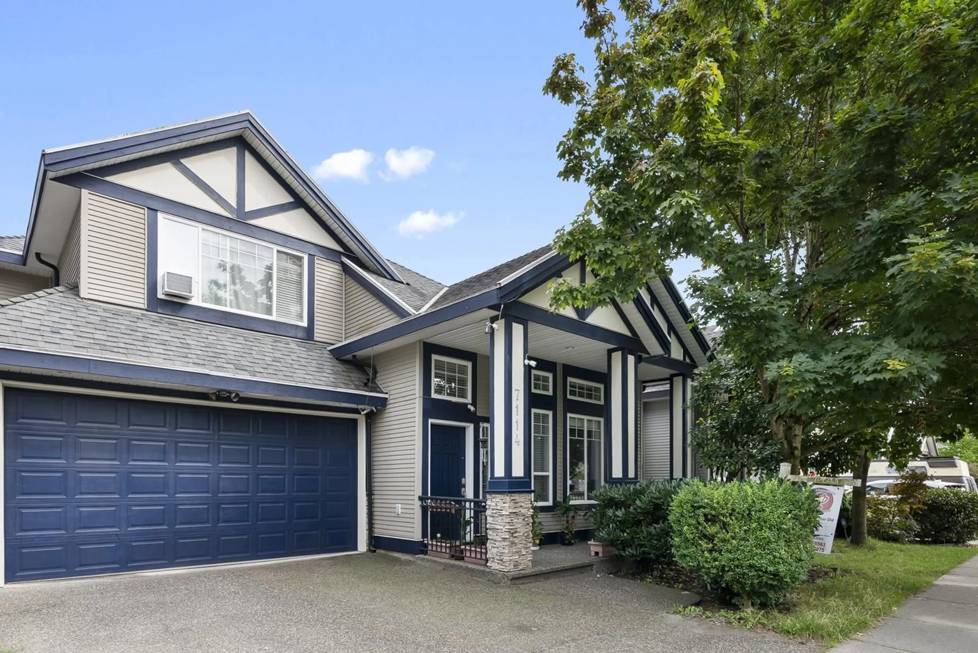 Home with vinyl exterior material, street for 7114 148, Surrey British Columbia V3S3E4