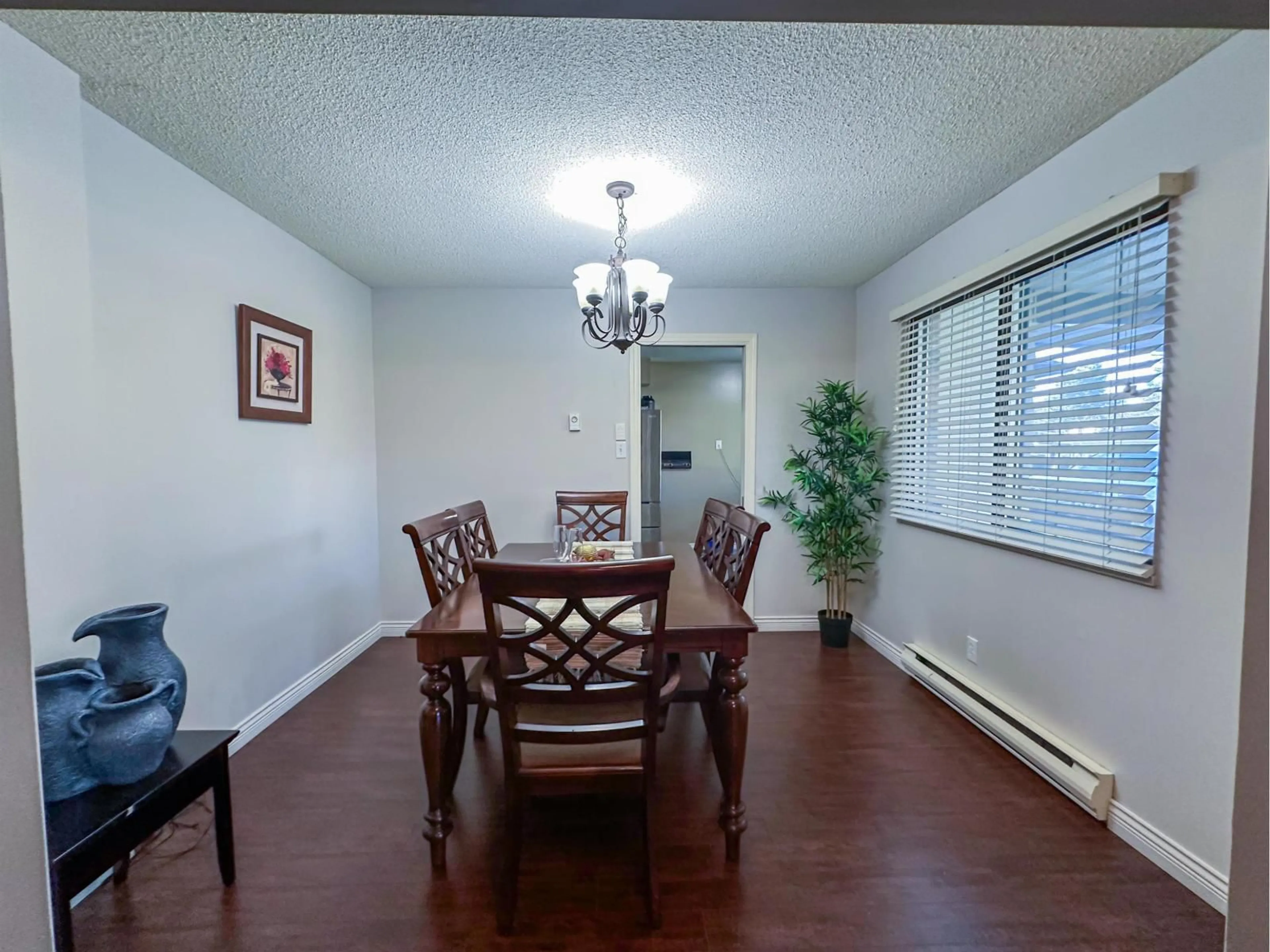 Dining room, wood/laminate floor for 15324 22, Surrey British Columbia V4A5Y8