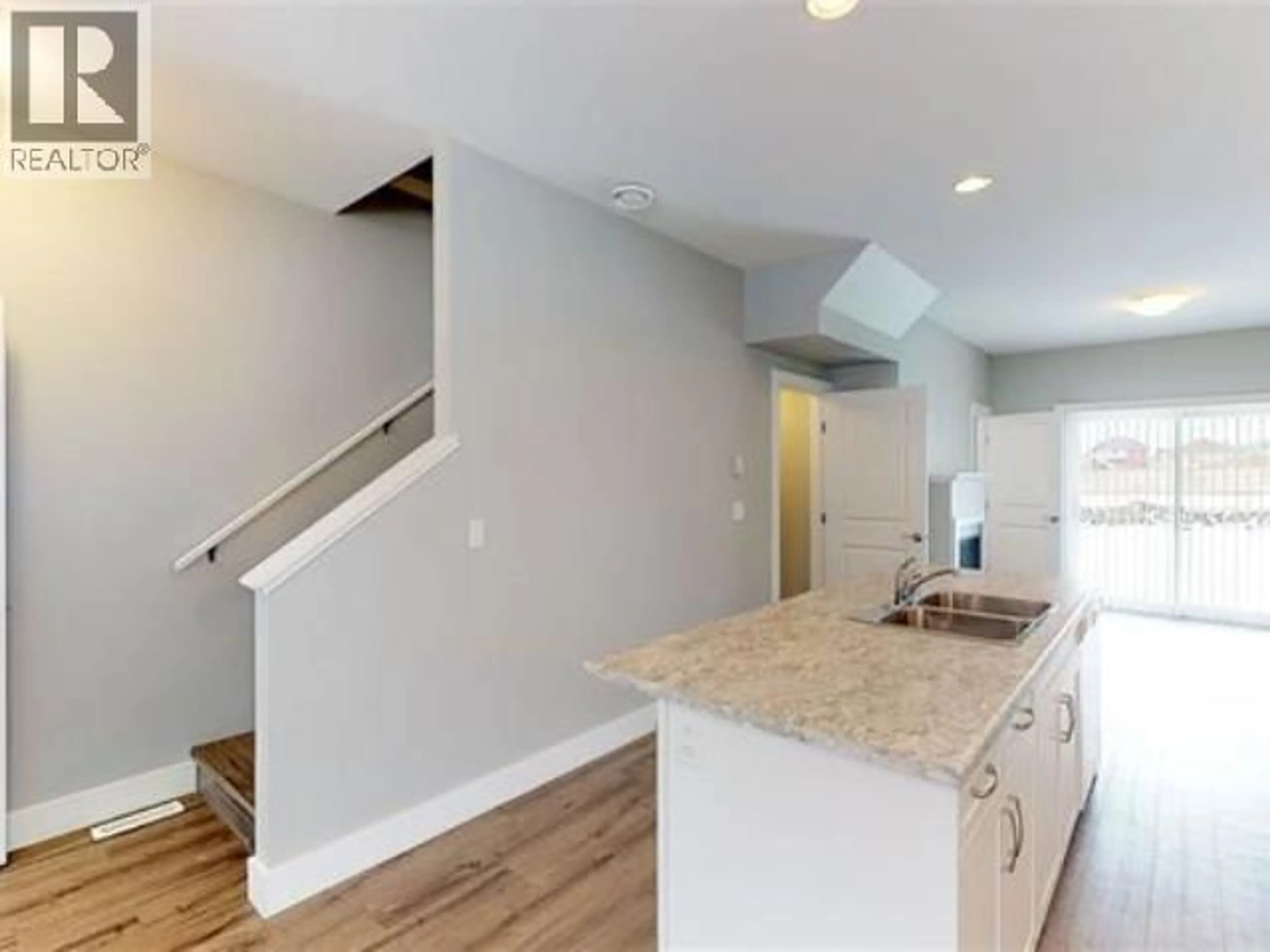 Open concept kitchen, unknown for 132 - 10904 102 AVENUE, Fort St. John British Columbia V1J0M3