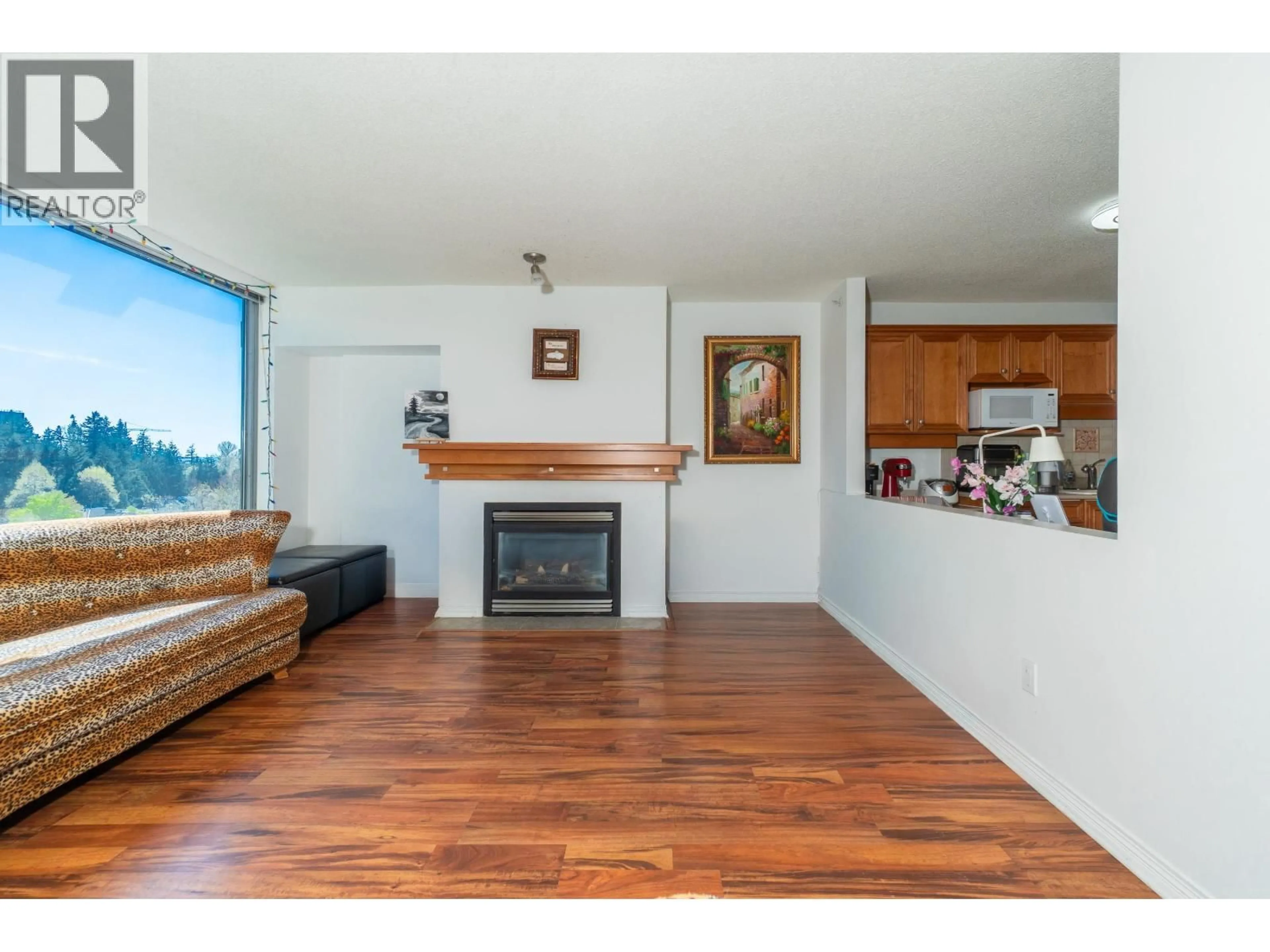 Living room with furniture, wood/laminate floor for 707 - 5639 HAMPTON PLACE, Vancouver British Columbia V6T2H6