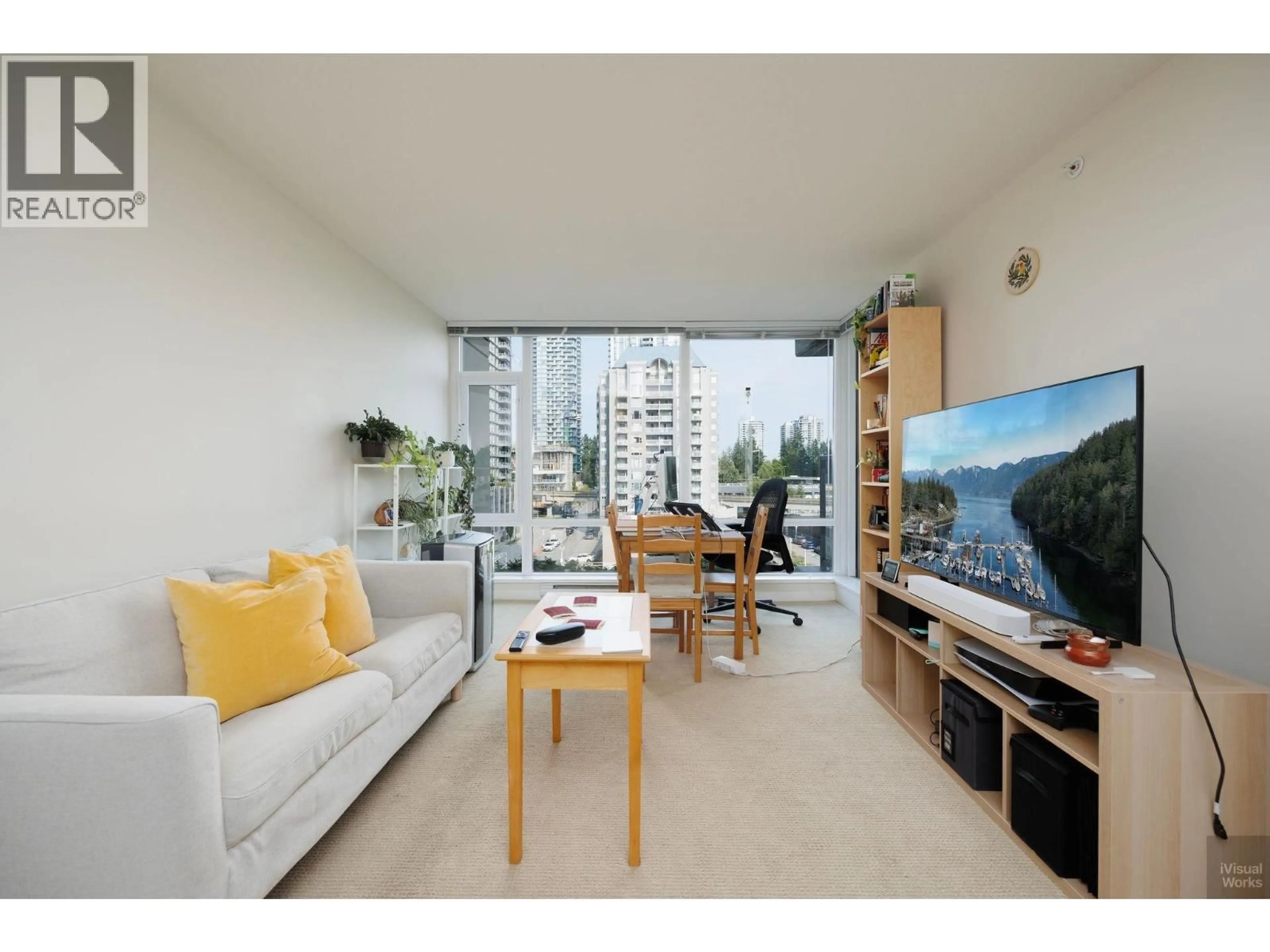Living room with furniture, unknown for 704 - 2980 ATLANTIC AVENUE, Coquitlam British Columbia V3B0G2