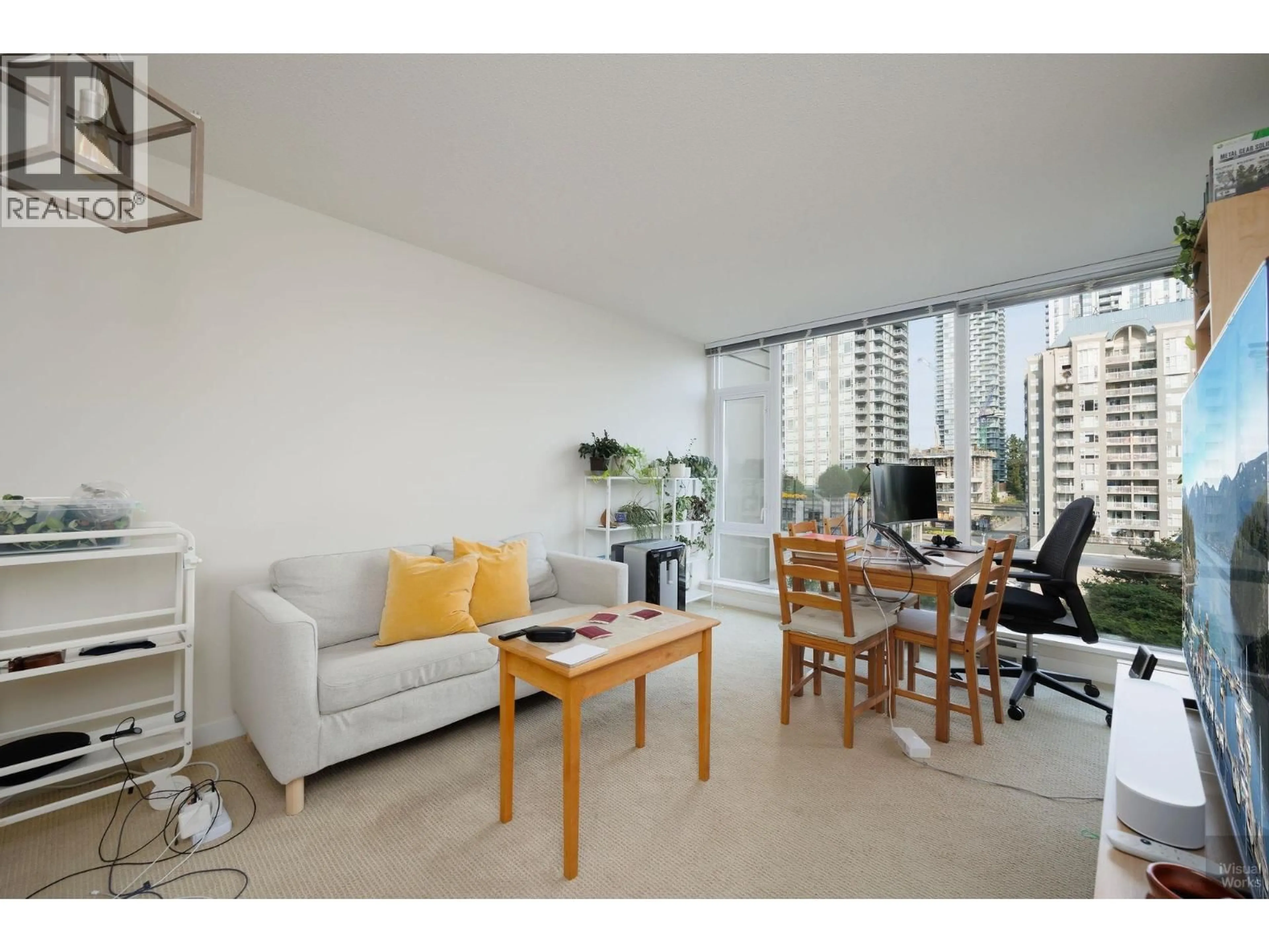 Living room with furniture, unknown for 704 - 2980 ATLANTIC AVENUE, Coquitlam British Columbia V3B0G2