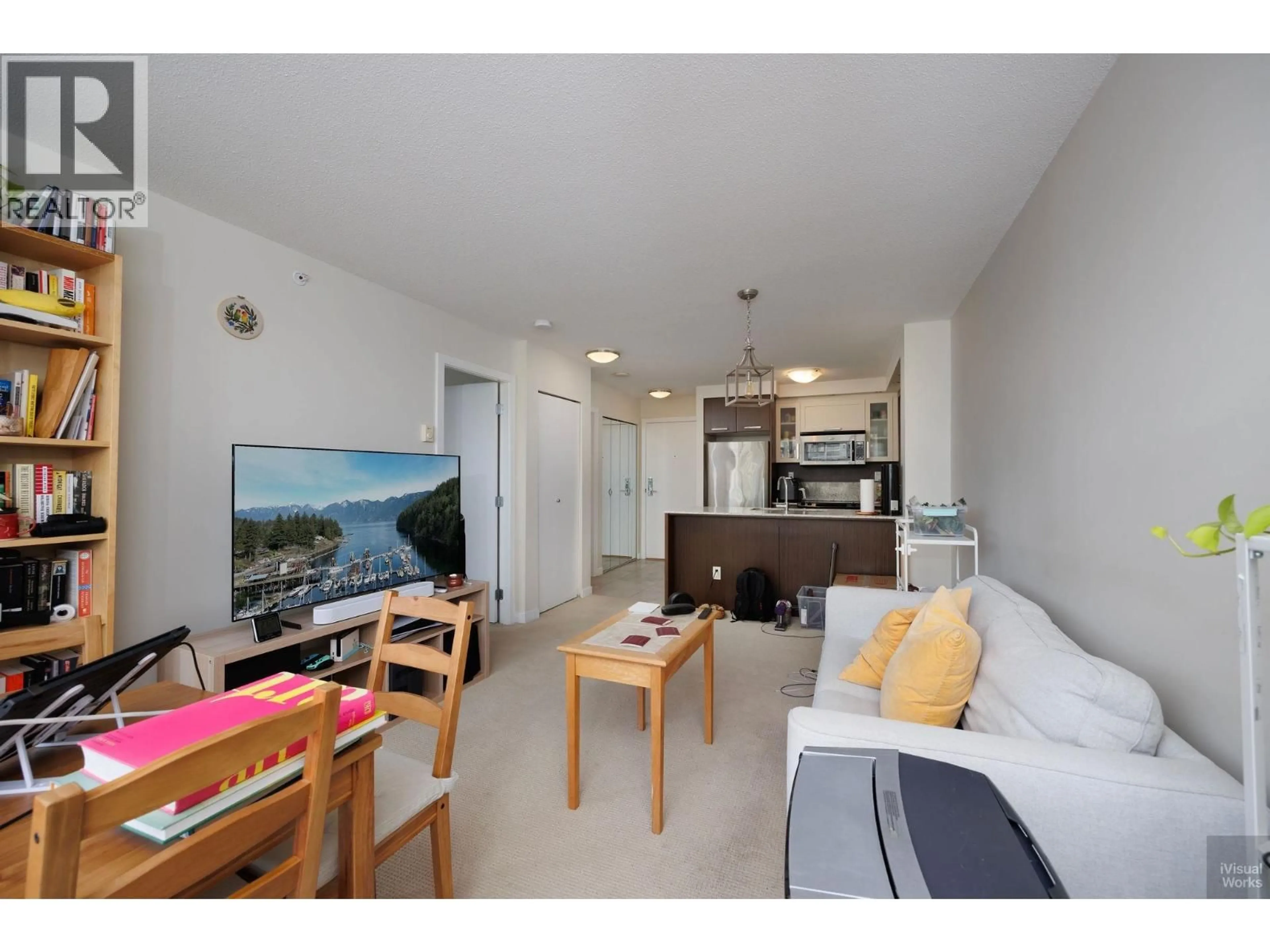 Living room with furniture, wood/laminate floor for 704 - 2980 ATLANTIC AVENUE, Coquitlam British Columbia V3B0G2