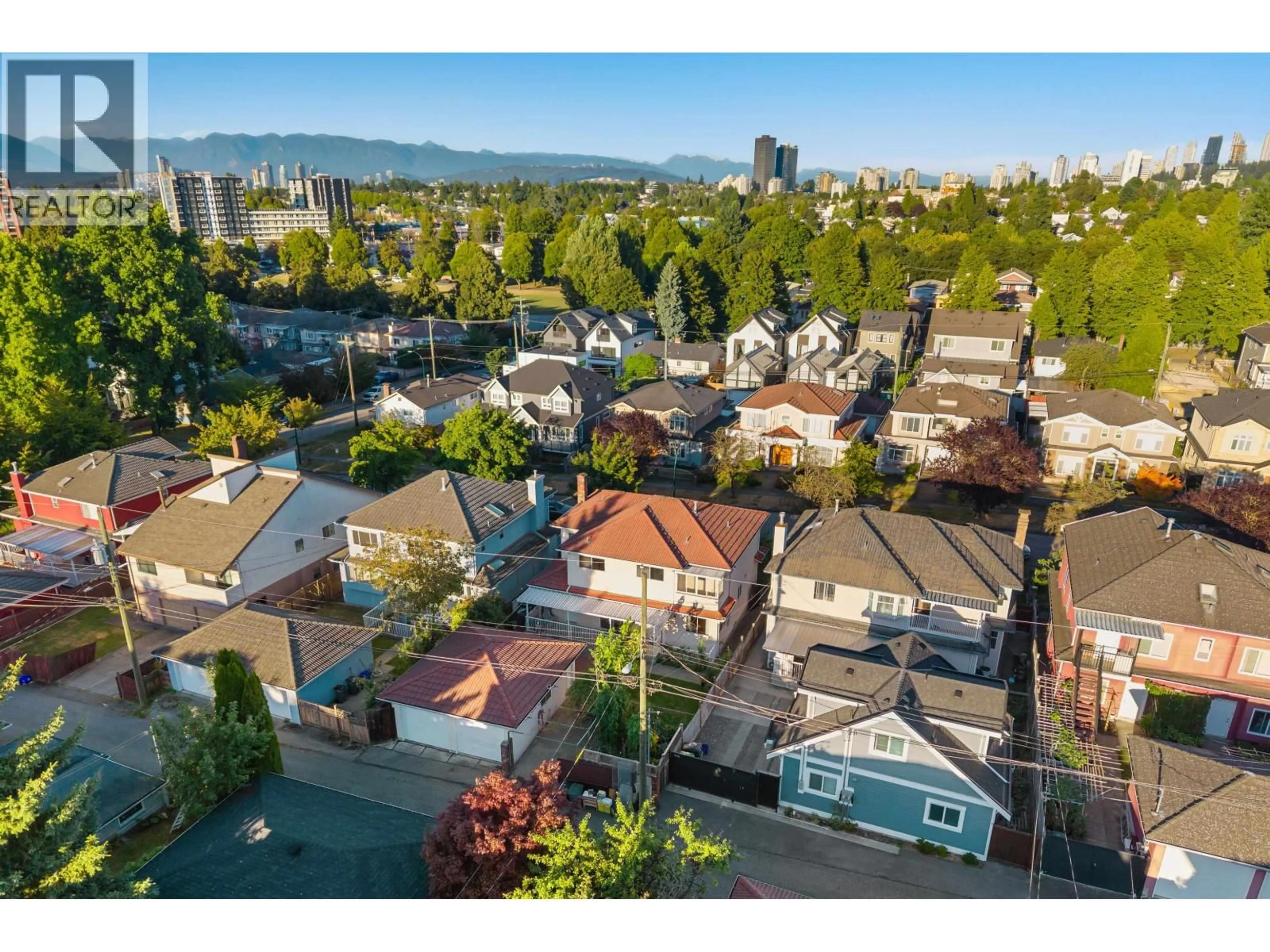 A pic from outside/outdoor area/front of a property/back of a property/a pic from drone, water/lake/river/ocean view for 5455 CHAMBERS STREET, Vancouver British Columbia V5R3M3