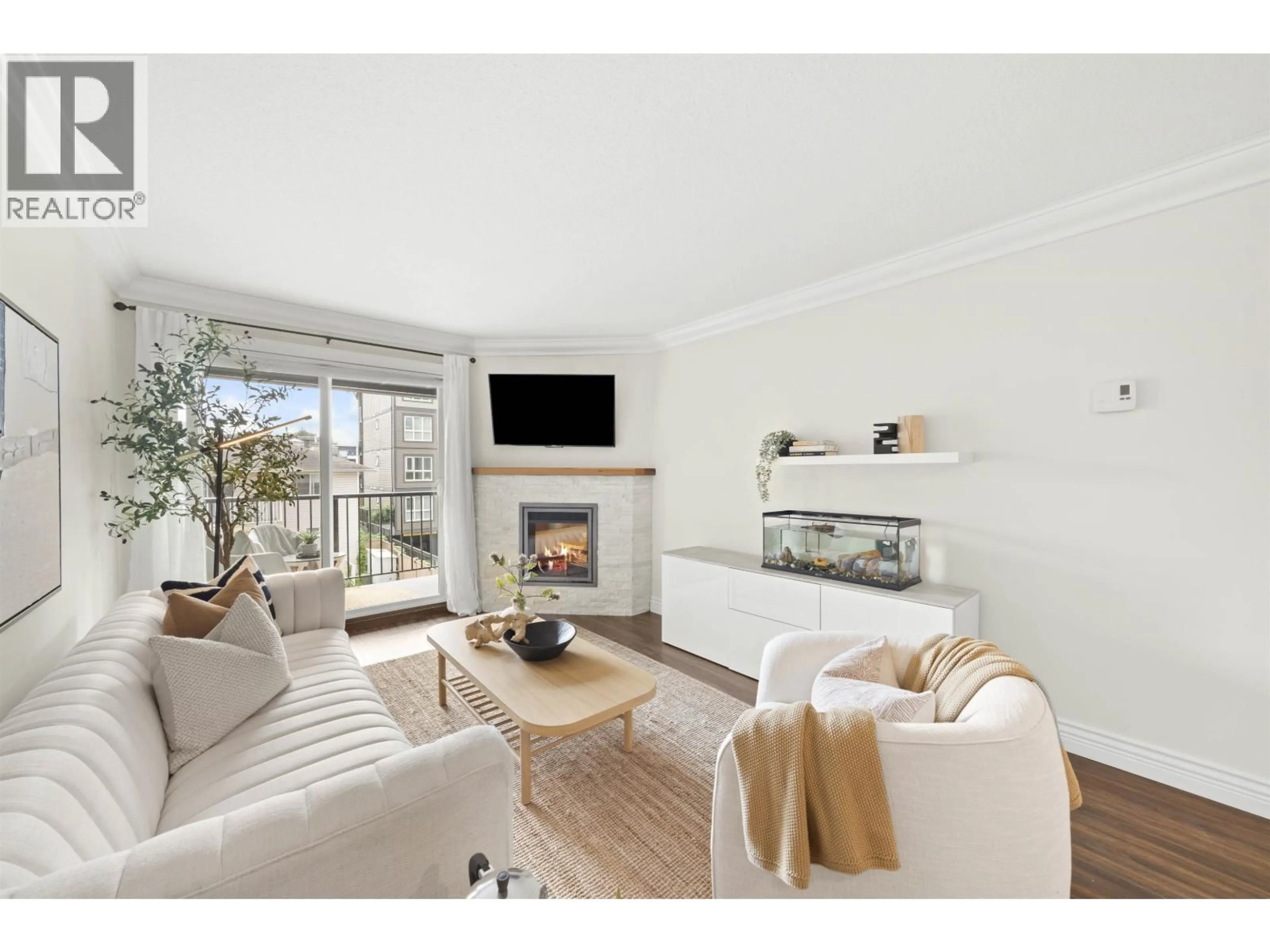Living room with furniture, wood/laminate floor for 201 - 2344 ATKINS AVENUE, Port Coquitlam British Columbia V3C1Y8