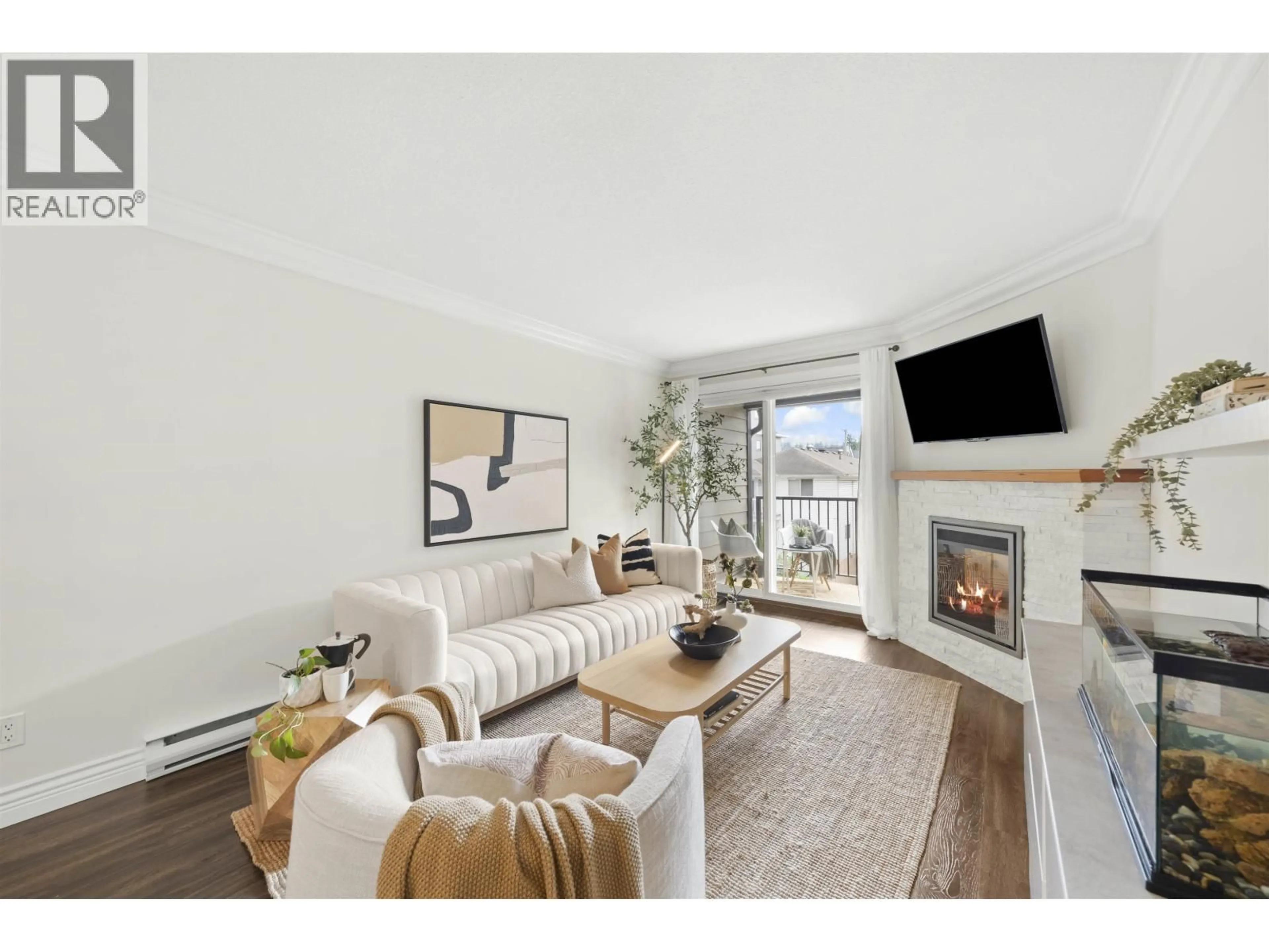 Living room with furniture, unknown for 201 - 2344 ATKINS AVENUE, Port Coquitlam British Columbia V3C1Y8