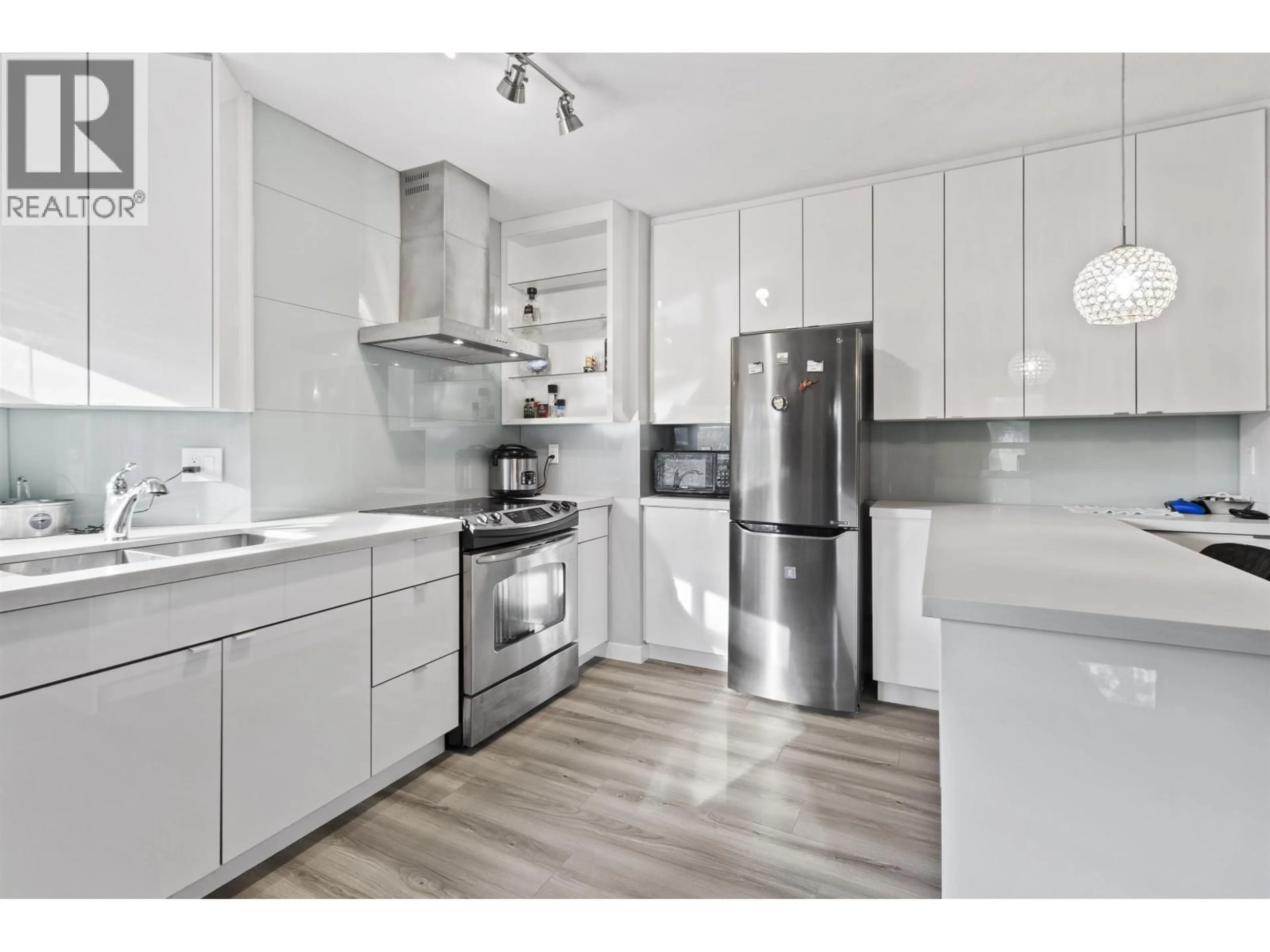 Open concept kitchen, unknown for 106 - 1988 37TH AVENUE, Vancouver British Columbia V5P1G1