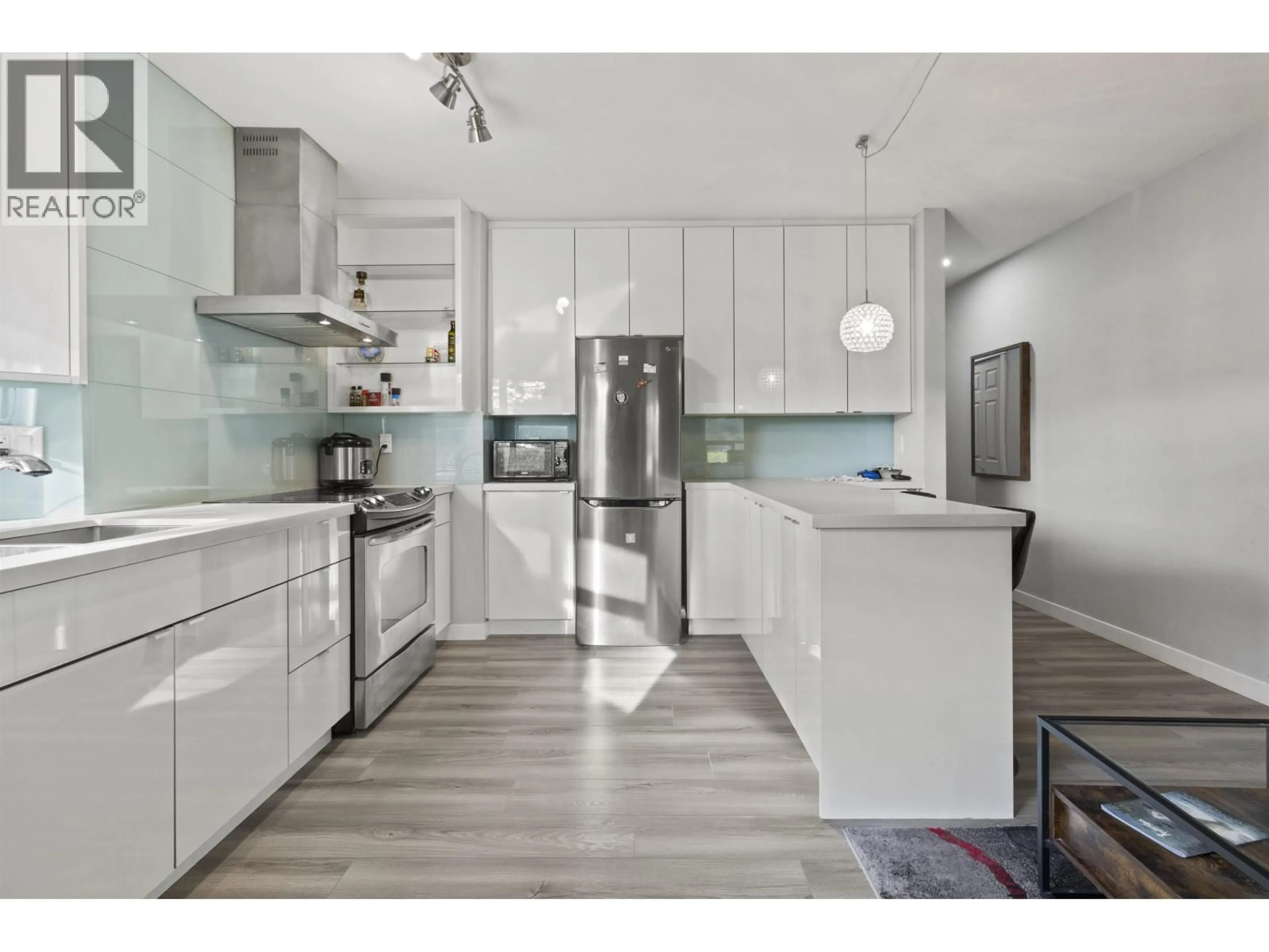 Open concept kitchen, unknown for 106 - 1988 37TH AVENUE, Vancouver British Columbia V5P1G1