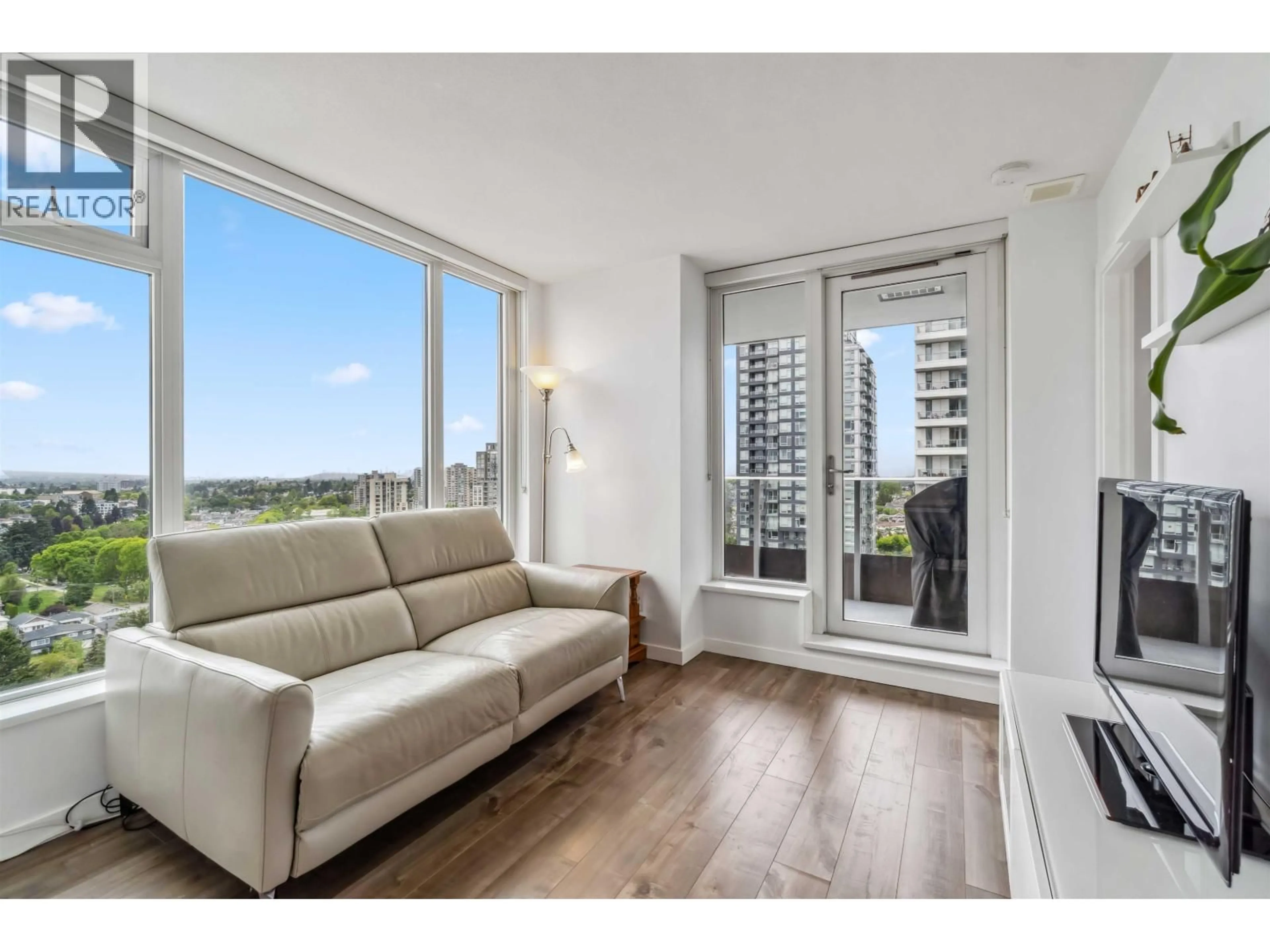 Living room with furniture, wood/laminate floor for 1902 - 5665 BOUNDARY ROAD, Vancouver British Columbia V5R0E4