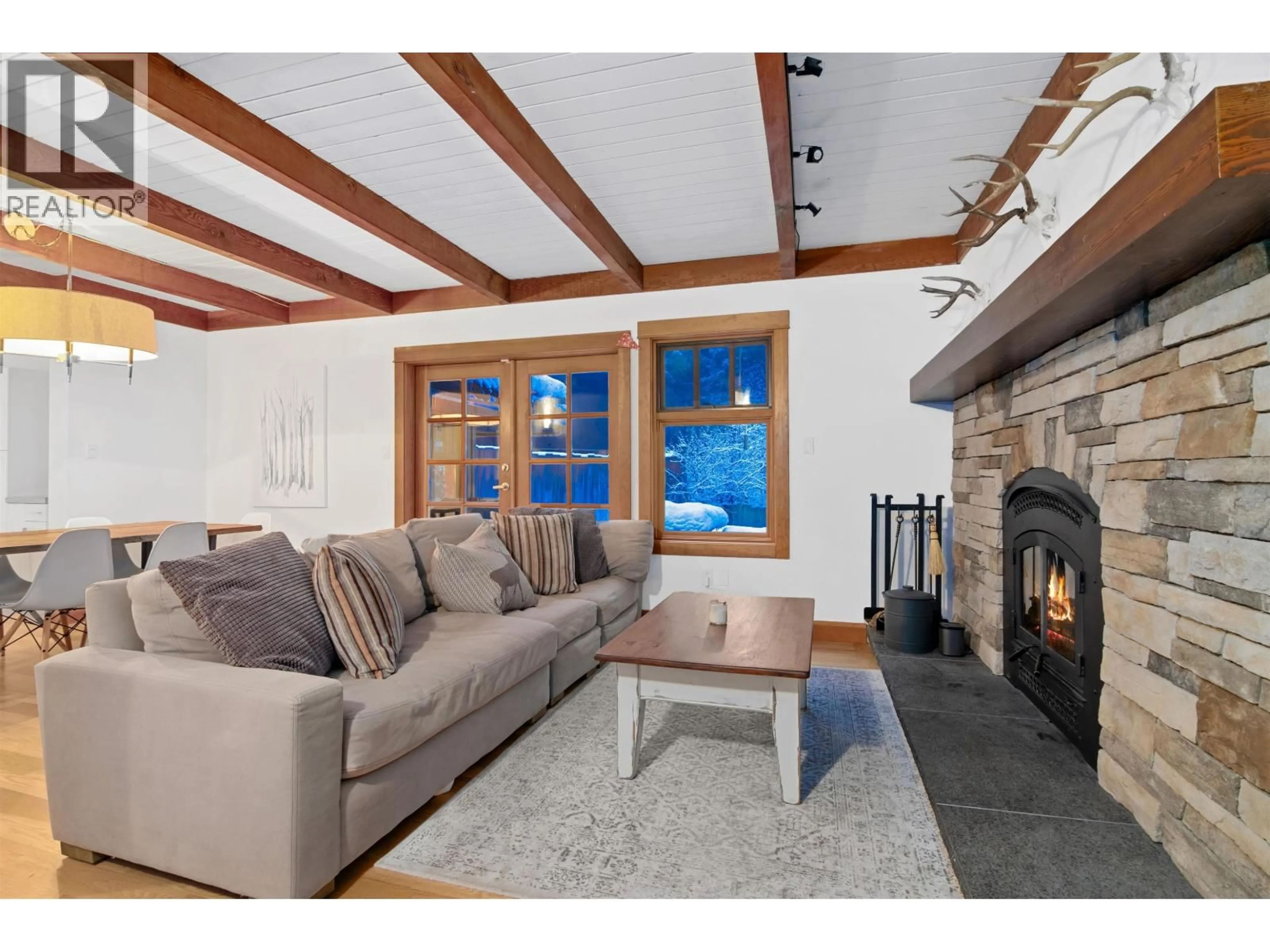 Living room with furniture, wood/laminate floor for 6411 EASY STREET, Whistler British Columbia V8E0C5