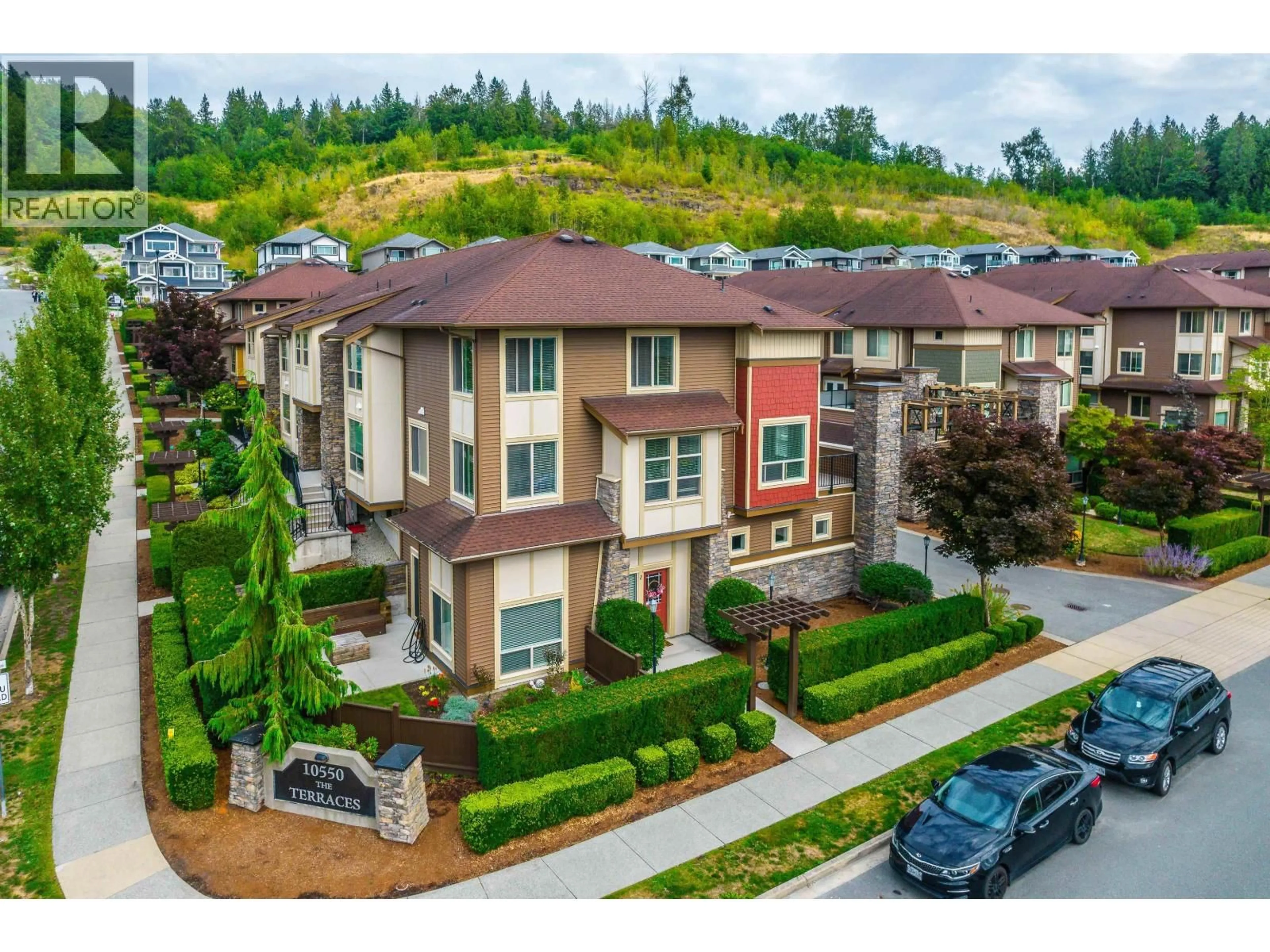 A pic from outside/outdoor area/front of a property/back of a property/a pic from drone, street for 1 - 10550 248 STREET, Maple Ridge British Columbia V2W0H9