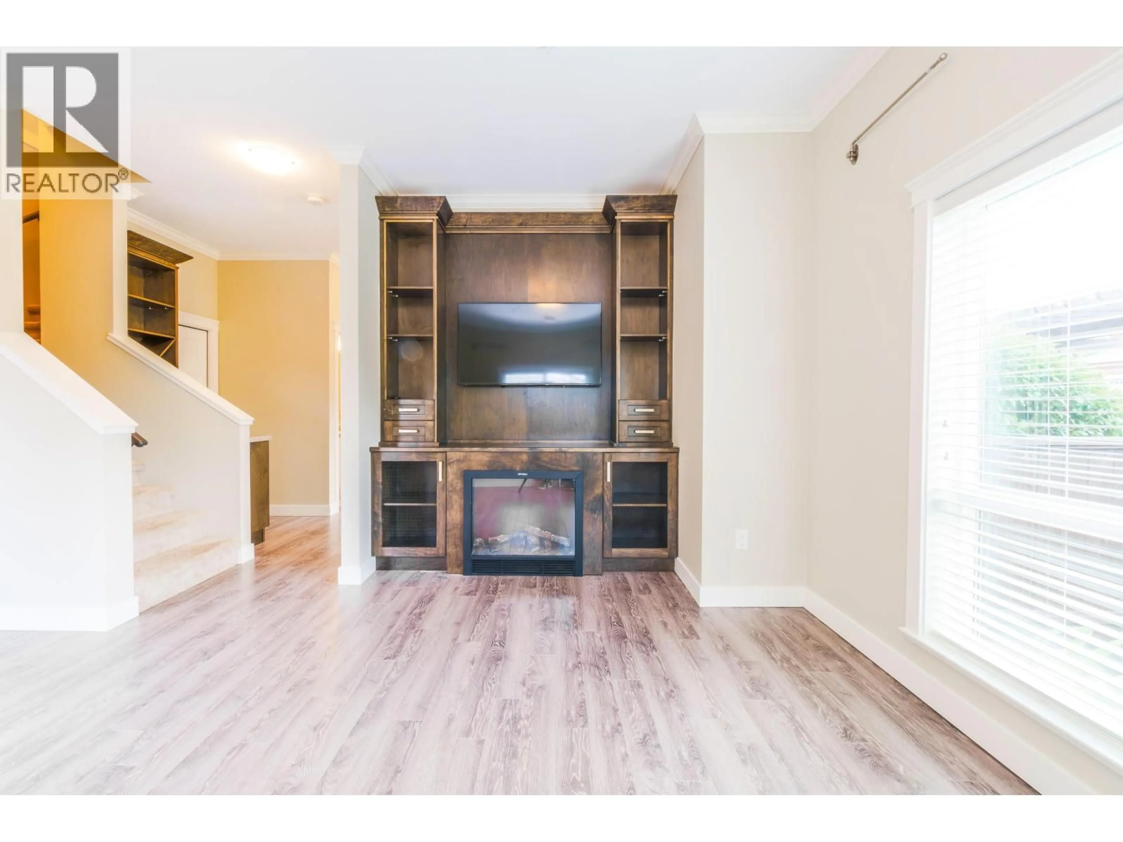 Living room with furniture, wood/laminate floor for 1 - 10550 248 STREET, Maple Ridge British Columbia V2W0H9
