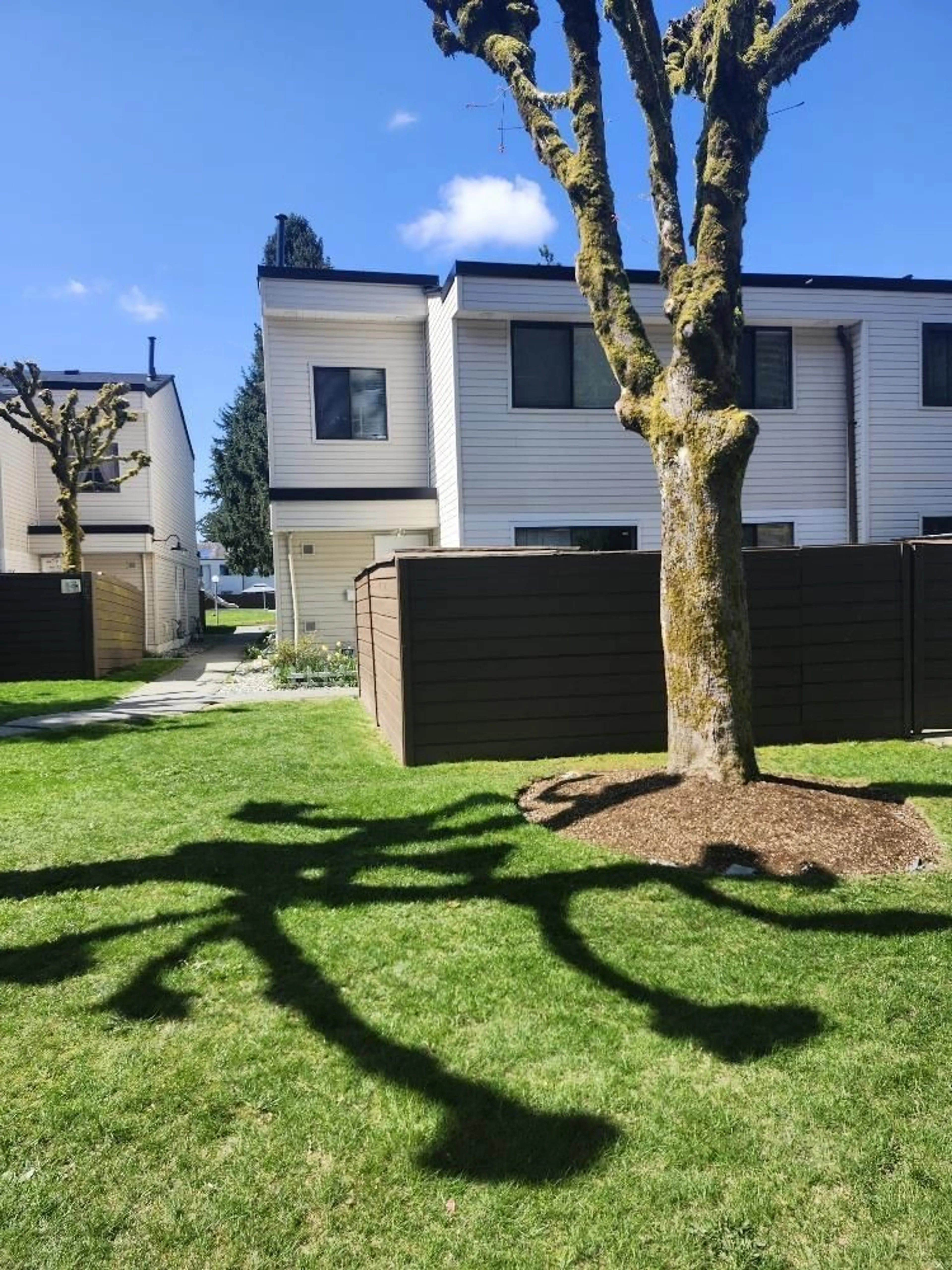 A pic from outside/outdoor area/front of a property/back of a property/a pic from drone, street for 121 - 14159 104, Surrey British Columbia V3T1X6
